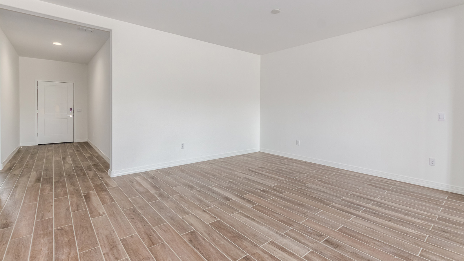 Introducing The Catalina, an expansive single-story home set in the serene and spacious Sahuarita Acres community. Covering 2,392 square feet, this residence offers four bedrooms and three bathrooms, perfectly balancing space and functionality for modern family living.  As you step into The Catalina, the entryway opens up to reveal a generous dining room that leads directly into the heart of the home—the great room. This central living space is designed for both relaxation and entertainment, with large windows that invite abundant natural light. The adjoining kitchen, complete with a large island, quartz countertops, and 42” upper cabinets, is as practical as it is stylish. A walk-in pantry provides ample storage, ensuring that everything you need is at your fingertips.  The primary bedroom, located in its own private wing, features a spacious walk-in closet and an en-suite bathroom equipped with dual sinks and a luxurious shower, offering a perfect space for winding down after a busy day. The additional three bedrooms are well-spaced throughout the home, each offering easy access to one of the two additional bathrooms, making it ideal for family living or hosting guests.  One of the standout features of The Catalina is its seamless blend of indoor and outdoor living. The covered patio, accessible from the great room, is an ideal spot for outdoor dining or simply enjoying the expansive one-acre lot that comes with each home in Sahuarita Acres. Whether you envision a garden, a play area, or even a pool, the possibilities are endless with the amount of outdoor space available.  The Catalina also includes a three-car garage and ample driveway space, perfect for parking vehicles, RVs, or additional storage. With D.R. Horton’s Home is Connected® Smart Home package, this home ensures you stay connected and secure, featuring a smart thermostat, video doorbell, keyless entry, a Wi-Fi-enabled garage door opener, and more.  Built with energy efficiency in mind, The Catalina features spray foam insulation and meets DOE Zero Energy Ready Home standards, helping you save on energy costs while contributing to a greener environment.  Nestled in the tranquil Sahuarita Acres community, residents enjoy the best of both worlds—peaceful, spacious living with easy access to urban amenities and outdoor recreation. With its combination of modern conveniences, thoughtful design, and expansive lots, The Catalina offers a lifestyle that truly captures the essence of Arizona living.