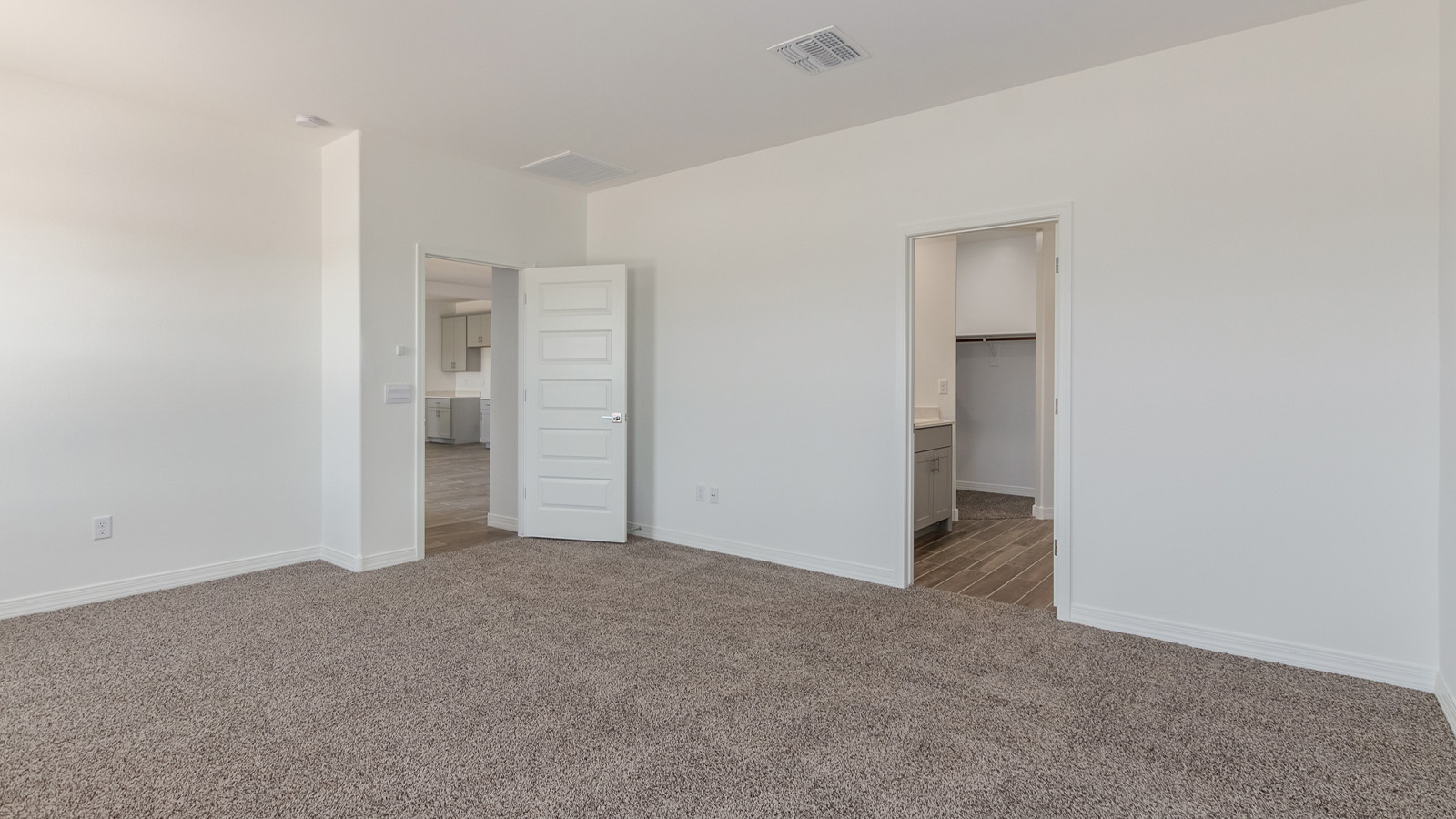 Introducing The Catalina, an expansive single-story home set in the serene and spacious Sahuarita Acres community. Covering 2,392 square feet, this residence offers four bedrooms and three bathrooms, perfectly balancing space and functionality for modern family living.  As you step into The Catalina, the entryway opens up to reveal a generous dining room that leads directly into the heart of the home—the great room. This central living space is designed for both relaxation and entertainment, with large windows that invite abundant natural light. The adjoining kitchen, complete with a large island, quartz countertops, and 42” upper cabinets, is as practical as it is stylish. A walk-in pantry provides ample storage, ensuring that everything you need is at your fingertips.  The primary bedroom, located in its own private wing, features a spacious walk-in closet and an en-suite bathroom equipped with dual sinks and a luxurious shower, offering a perfect space for winding down after a busy day. The additional three bedrooms are well-spaced throughout the home, each offering easy access to one of the two additional bathrooms, making it ideal for family living or hosting guests.  One of the standout features of The Catalina is its seamless blend of indoor and outdoor living. The covered patio, accessible from the great room, is an ideal spot for outdoor dining or simply enjoying the expansive one-acre lot that comes with each home in Sahuarita Acres. Whether you envision a garden, a play area, or even a pool, the possibilities are endless with the amount of outdoor space available.  The Catalina also includes a three-car garage and ample driveway space, perfect for parking vehicles, RVs, or additional storage. With D.R. Horton’s Home is Connected® Smart Home package, this home ensures you stay connected and secure, featuring a smart thermostat, video doorbell, keyless entry, a Wi-Fi-enabled garage door opener, and more.  Built with energy efficiency in mind, The Catalina features spray foam insulation and meets DOE Zero Energy Ready Home standards, helping you save on energy costs while contributing to a greener environment.  Nestled in the tranquil Sahuarita Acres community, residents enjoy the best of both worlds—peaceful, spacious living with easy access to urban amenities and outdoor recreation. With its combination of modern conveniences, thoughtful design, and expansive lots, The Catalina offers a lifestyle that truly captures the essence of Arizona living.