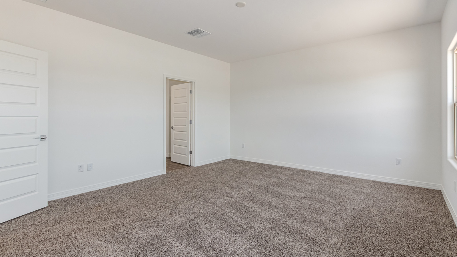 Introducing The Catalina, an expansive single-story home set in the serene and spacious Sahuarita Acres community. Covering 2,392 square feet, this residence offers four bedrooms and three bathrooms, perfectly balancing space and functionality for modern family living.  As you step into The Catalina, the entryway opens up to reveal a generous dining room that leads directly into the heart of the home—the great room. This central living space is designed for both relaxation and entertainment, with large windows that invite abundant natural light. The adjoining kitchen, complete with a large island, quartz countertops, and 42” upper cabinets, is as practical as it is stylish. A walk-in pantry provides ample storage, ensuring that everything you need is at your fingertips.  The primary bedroom, located in its own private wing, features a spacious walk-in closet and an en-suite bathroom equipped with dual sinks and a luxurious shower, offering a perfect space for winding down after a busy day. The additional three bedrooms are well-spaced throughout the home, each offering easy access to one of the two additional bathrooms, making it ideal for family living or hosting guests.  One of the standout features of The Catalina is its seamless blend of indoor and outdoor living. The covered patio, accessible from the great room, is an ideal spot for outdoor dining or simply enjoying the expansive one-acre lot that comes with each home in Sahuarita Acres. Whether you envision a garden, a play area, or even a pool, the possibilities are endless with the amount of outdoor space available.  The Catalina also includes a three-car garage and ample driveway space, perfect for parking vehicles, RVs, or additional storage. With D.R. Horton’s Home is Connected® Smart Home package, this home ensures you stay connected and secure, featuring a smart thermostat, video doorbell, keyless entry, a Wi-Fi-enabled garage door opener, and more.  Built with energy efficiency in mind, The Catalina features spray foam insulation and meets DOE Zero Energy Ready Home standards, helping you save on energy costs while contributing to a greener environment.  Nestled in the tranquil Sahuarita Acres community, residents enjoy the best of both worlds—peaceful, spacious living with easy access to urban amenities and outdoor recreation. With its combination of modern conveniences, thoughtful design, and expansive lots, The Catalina offers a lifestyle that truly captures the essence of Arizona living.