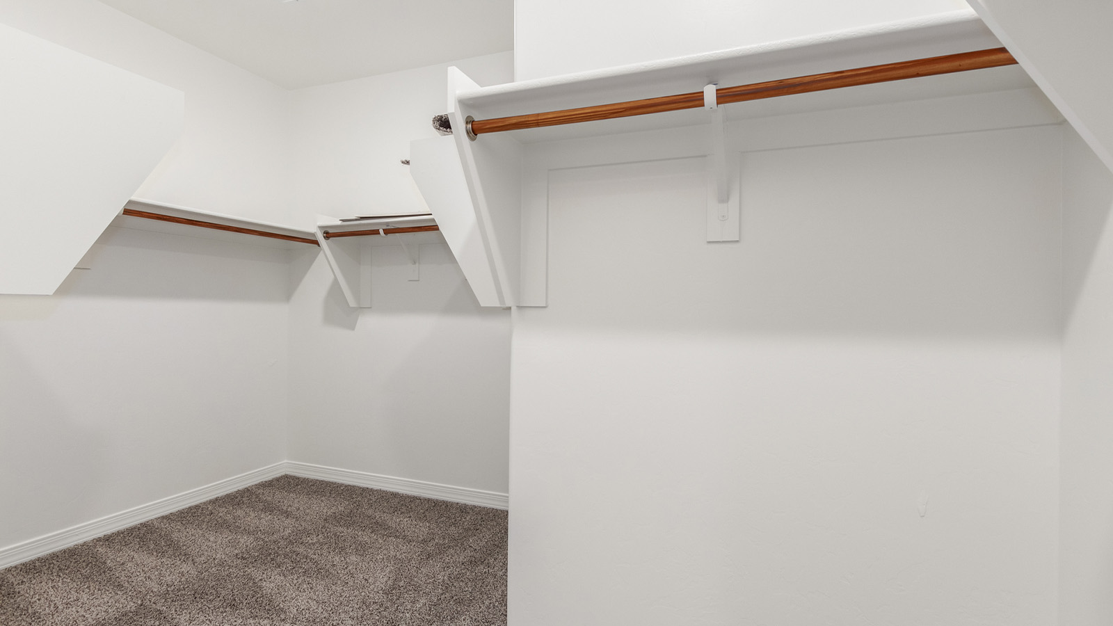 Introducing The Catalina, an expansive single-story home set in the serene and spacious Sahuarita Acres community. Covering 2,392 square feet, this residence offers four bedrooms and three bathrooms, perfectly balancing space and functionality for modern family living.  As you step into The Catalina, the entryway opens up to reveal a generous dining room that leads directly into the heart of the home—the great room. This central living space is designed for both relaxation and entertainment, with large windows that invite abundant natural light. The adjoining kitchen, complete with a large island, quartz countertops, and 42” upper cabinets, is as practical as it is stylish. A walk-in pantry provides ample storage, ensuring that everything you need is at your fingertips.  The primary bedroom, located in its own private wing, features a spacious walk-in closet and an en-suite bathroom equipped with dual sinks and a luxurious shower, offering a perfect space for winding down after a busy day. The additional three bedrooms are well-spaced throughout the home, each offering easy access to one of the two additional bathrooms, making it ideal for family living or hosting guests.  One of the standout features of The Catalina is its seamless blend of indoor and outdoor living. The covered patio, accessible from the great room, is an ideal spot for outdoor dining or simply enjoying the expansive one-acre lot that comes with each home in Sahuarita Acres. Whether you envision a garden, a play area, or even a pool, the possibilities are endless with the amount of outdoor space available.  The Catalina also includes a three-car garage and ample driveway space, perfect for parking vehicles, RVs, or additional storage. With D.R. Horton’s Home is Connected® Smart Home package, this home ensures you stay connected and secure, featuring a smart thermostat, video doorbell, keyless entry, a Wi-Fi-enabled garage door opener, and more.  Built with energy efficiency in mind, The Catalina features spray foam insulation and meets DOE Zero Energy Ready Home standards, helping you save on energy costs while contributing to a greener environment.  Nestled in the tranquil Sahuarita Acres community, residents enjoy the best of both worlds—peaceful, spacious living with easy access to urban amenities and outdoor recreation. With its combination of modern conveniences, thoughtful design, and expansive lots, The Catalina offers a lifestyle that truly captures the essence of Arizona living.