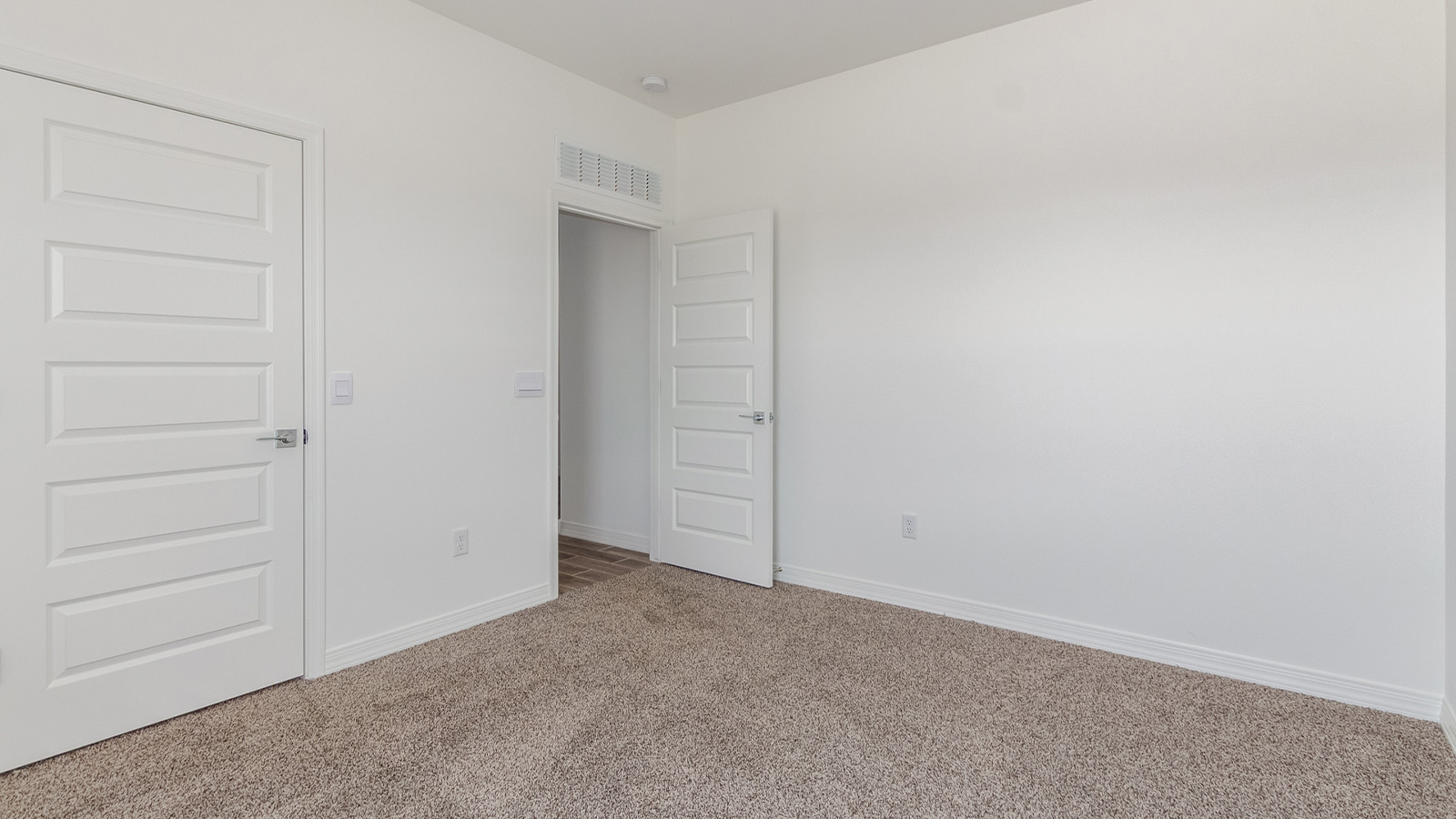 Introducing The Catalina, an expansive single-story home set in the serene and spacious Sahuarita Acres community. Covering 2,392 square feet, this residence offers four bedrooms and three bathrooms, perfectly balancing space and functionality for modern family living.  As you step into The Catalina, the entryway opens up to reveal a generous dining room that leads directly into the heart of the home—the great room. This central living space is designed for both relaxation and entertainment, with large windows that invite abundant natural light. The adjoining kitchen, complete with a large island, quartz countertops, and 42” upper cabinets, is as practical as it is stylish. A walk-in pantry provides ample storage, ensuring that everything you need is at your fingertips.  The primary bedroom, located in its own private wing, features a spacious walk-in closet and an en-suite bathroom equipped with dual sinks and a luxurious shower, offering a perfect space for winding down after a busy day. The additional three bedrooms are well-spaced throughout the home, each offering easy access to one of the two additional bathrooms, making it ideal for family living or hosting guests.  One of the standout features of The Catalina is its seamless blend of indoor and outdoor living. The covered patio, accessible from the great room, is an ideal spot for outdoor dining or simply enjoying the expansive one-acre lot that comes with each home in Sahuarita Acres. Whether you envision a garden, a play area, or even a pool, the possibilities are endless with the amount of outdoor space available.  The Catalina also includes a three-car garage and ample driveway space, perfect for parking vehicles, RVs, or additional storage. With D.R. Horton’s Home is Connected® Smart Home package, this home ensures you stay connected and secure, featuring a smart thermostat, video doorbell, keyless entry, a Wi-Fi-enabled garage door opener, and more.  Built with energy efficiency in mind, The Catalina features spray foam insulation and meets DOE Zero Energy Ready Home standards, helping you save on energy costs while contributing to a greener environment.  Nestled in the tranquil Sahuarita Acres community, residents enjoy the best of both worlds—peaceful, spacious living with easy access to urban amenities and outdoor recreation. With its combination of modern conveniences, thoughtful design, and expansive lots, The Catalina offers a lifestyle that truly captures the essence of Arizona living.