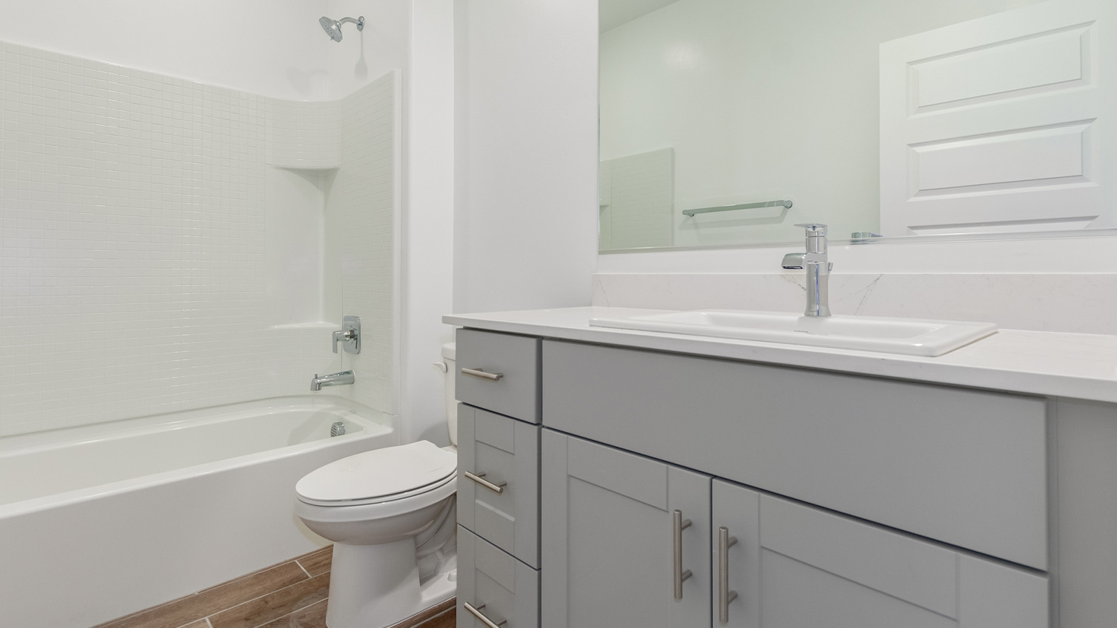 Introducing The Catalina, an expansive single-story home set in the serene and spacious Sahuarita Acres community. Covering 2,392 square feet, this residence offers four bedrooms and three bathrooms, perfectly balancing space and functionality for modern family living.  As you step into The Catalina, the entryway opens up to reveal a generous dining room that leads directly into the heart of the home—the great room. This central living space is designed for both relaxation and entertainment, with large windows that invite abundant natural light. The adjoining kitchen, complete with a large island, quartz countertops, and 42” upper cabinets, is as practical as it is stylish. A walk-in pantry provides ample storage, ensuring that everything you need is at your fingertips.  The primary bedroom, located in its own private wing, features a spacious walk-in closet and an en-suite bathroom equipped with dual sinks and a luxurious shower, offering a perfect space for winding down after a busy day. The additional three bedrooms are well-spaced throughout the home, each offering easy access to one of the two additional bathrooms, making it ideal for family living or hosting guests.  One of the standout features of The Catalina is its seamless blend of indoor and outdoor living. The covered patio, accessible from the great room, is an ideal spot for outdoor dining or simply enjoying the expansive one-acre lot that comes with each home in Sahuarita Acres. Whether you envision a garden, a play area, or even a pool, the possibilities are endless with the amount of outdoor space available.  The Catalina also includes a three-car garage and ample driveway space, perfect for parking vehicles, RVs, or additional storage. With D.R. Horton’s Home is Connected® Smart Home package, this home ensures you stay connected and secure, featuring a smart thermostat, video doorbell, keyless entry, a Wi-Fi-enabled garage door opener, and more.  Built with energy efficiency in mind, The Catalina features spray foam insulation and meets DOE Zero Energy Ready Home standards, helping you save on energy costs while contributing to a greener environment.  Nestled in the tranquil Sahuarita Acres community, residents enjoy the best of both worlds—peaceful, spacious living with easy access to urban amenities and outdoor recreation. With its combination of modern conveniences, thoughtful design, and expansive lots, The Catalina offers a lifestyle that truly captures the essence of Arizona living.