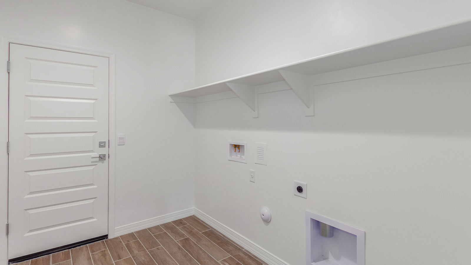 Introducing The Catalina, an expansive single-story home set in the serene and spacious Sahuarita Acres community. Covering 2,392 square feet, this residence offers four bedrooms and three bathrooms, perfectly balancing space and functionality for modern family living.  As you step into The Catalina, the entryway opens up to reveal a generous dining room that leads directly into the heart of the home—the great room. This central living space is designed for both relaxation and entertainment, with large windows that invite abundant natural light. The adjoining kitchen, complete with a large island, quartz countertops, and 42” upper cabinets, is as practical as it is stylish. A walk-in pantry provides ample storage, ensuring that everything you need is at your fingertips.  The primary bedroom, located in its own private wing, features a spacious walk-in closet and an en-suite bathroom equipped with dual sinks and a luxurious shower, offering a perfect space for winding down after a busy day. The additional three bedrooms are well-spaced throughout the home, each offering easy access to one of the two additional bathrooms, making it ideal for family living or hosting guests.  One of the standout features of The Catalina is its seamless blend of indoor and outdoor living. The covered patio, accessible from the great room, is an ideal spot for outdoor dining or simply enjoying the expansive one-acre lot that comes with each home in Sahuarita Acres. Whether you envision a garden, a play area, or even a pool, the possibilities are endless with the amount of outdoor space available.  The Catalina also includes a three-car garage and ample driveway space, perfect for parking vehicles, RVs, or additional storage. With D.R. Horton’s Home is Connected® Smart Home package, this home ensures you stay connected and secure, featuring a smart thermostat, video doorbell, keyless entry, a Wi-Fi-enabled garage door opener, and more.  Built with energy efficiency in mind, The Catalina features spray foam insulation and meets DOE Zero Energy Ready Home standards, helping you save on energy costs while contributing to a greener environment.  Nestled in the tranquil Sahuarita Acres community, residents enjoy the best of both worlds—peaceful, spacious living with easy access to urban amenities and outdoor recreation. With its combination of modern conveniences, thoughtful design, and expansive lots, The Catalina offers a lifestyle that truly captures the essence of Arizona living.