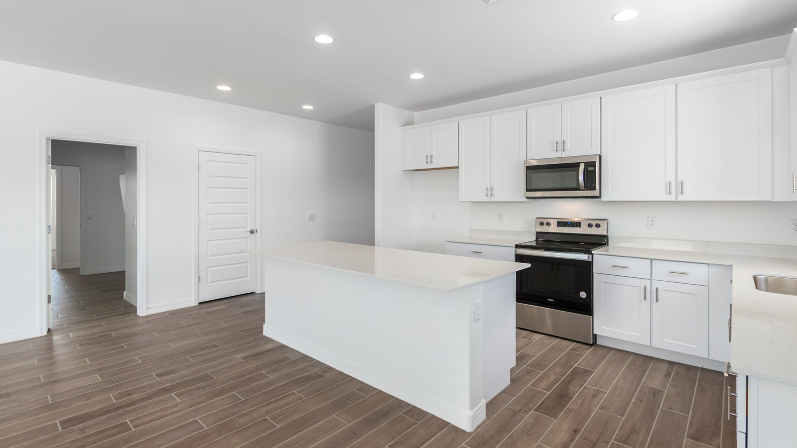 Welcome to The Sedona, a spacious and elegant single-story new home nestled in the expansive Sahuarita Acres community. Offering 2,530 square feet of living space, this home features five bedrooms and three bathrooms, designed to accommodate both comfort and functionality for modern family living.  As you step through the charming front porch, you are greeted by an inviting entryway that opens into a thoughtfully arranged interior. The heart of the home is the expansive great room, which seamlessly connects to the dining area and kitchen. This open-concept layout is perfect for those who enjoy entertaining or simply want a space where family life can flow naturally. The kitchen is a culinary haven, featuring a large island, sleek quartz countertops, and ample 42” upper cabinets for all your storage needs. A walk-in pantry ensures that your kitchen remains organized and efficient.  The primary bedroom is situated in its own private wing, offering a spacious walk-in closet and an en-suite bathroom with dual sinks and a luxurious shower. This room is designed as a peaceful haven, providing the perfect space to unwind at the end of the day. The additional four bedrooms are well-positioned within the home, each with easy access to one of the two additional bathrooms, making this layout ideal for families or hosting guests.  Outdoor living is a highlight of The Sedona, with a covered patio that extends from the great room, offering a seamless transition between indoor and outdoor spaces. Whether you envision hosting summer barbecues or simply enjoying the tranquility of your expansive one-acre lot, this outdoor space is perfect for creating your ideal backyard oasis.  Practical features of The Sedona include a three-car garage, which provides ample space for vehicles, storage, or even a workshop. The utility room is conveniently located near the kitchen, making household chores more manageable.  In line with modern living, The Sedona is equipped with D.R. Horton’s Home is Connected® Smart Home package, which includes a smart thermostat, video doorbell, keyless entry, a Wi-Fi-enabled garage door opener and more. The home is also designed with energy efficiency in mind, featuring spray foam insulation and meeting DOE Zero Energy Ready Home standards, ensuring long-term savings and environmental benefits.  Located within the peaceful Sahuarita Acres community, The Sedona offers residents the best of both worlds—spacious living with the conveniences of nearby urban amenities. Just 30 minutes from downtown Tucson and close to local attractions like the Titan Missile Museum and Madera Canyon, this home offers a lifestyle that embraces the essence of Arizona living.