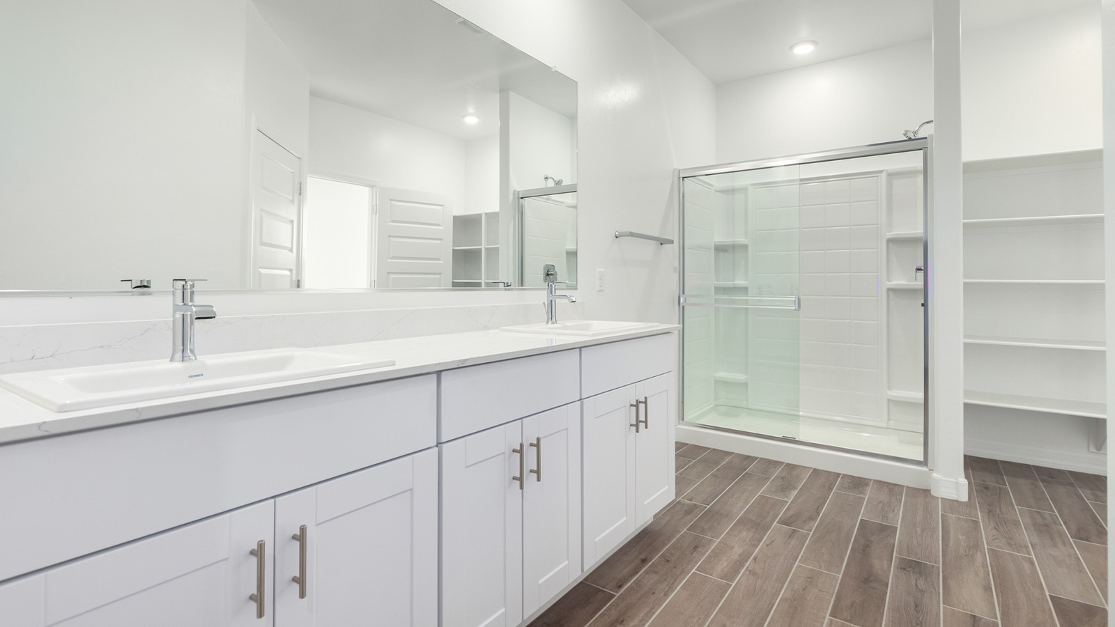 Welcome to The Sedona, a spacious and elegant single-story new home nestled in the expansive Sahuarita Acres community. Offering 2,530 square feet of living space, this home features five bedrooms and three bathrooms, designed to accommodate both comfort and functionality for modern family living.  As you step through the charming front porch, you are greeted by an inviting entryway that opens into a thoughtfully arranged interior. The heart of the home is the expansive great room, which seamlessly connects to the dining area and kitchen. This open-concept layout is perfect for those who enjoy entertaining or simply want a space where family life can flow naturally. The kitchen is a culinary haven, featuring a large island, sleek quartz countertops, and ample 42” upper cabinets for all your storage needs. A walk-in pantry ensures that your kitchen remains organized and efficient.  The primary bedroom is situated in its own private wing, offering a spacious walk-in closet and an en-suite bathroom with dual sinks and a luxurious shower. This room is designed as a peaceful haven, providing the perfect space to unwind at the end of the day. The additional four bedrooms are well-positioned within the home, each with easy access to one of the two additional bathrooms, making this layout ideal for families or hosting guests.  Outdoor living is a highlight of The Sedona, with a covered patio that extends from the great room, offering a seamless transition between indoor and outdoor spaces. Whether you envision hosting summer barbecues or simply enjoying the tranquility of your expansive one-acre lot, this outdoor space is perfect for creating your ideal backyard oasis.  Practical features of The Sedona include a three-car garage, which provides ample space for vehicles, storage, or even a workshop. The utility room is conveniently located near the kitchen, making household chores more manageable.  In line with modern living, The Sedona is equipped with D.R. Horton’s Home is Connected® Smart Home package, which includes a smart thermostat, video doorbell, keyless entry, a Wi-Fi-enabled garage door opener and more. The home is also designed with energy efficiency in mind, featuring spray foam insulation and meeting DOE Zero Energy Ready Home standards, ensuring long-term savings and environmental benefits.  Located within the peaceful Sahuarita Acres community, The Sedona offers residents the best of both worlds—spacious living with the conveniences of nearby urban amenities. Just 30 minutes from downtown Tucson and close to local attractions like the Titan Missile Museum and Madera Canyon, this home offers a lifestyle that embraces the essence of Arizona living.