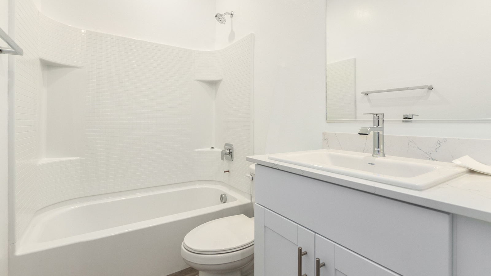 Welcome to The Sedona, a spacious and elegant single-story new home nestled in the expansive Sahuarita Acres community. Offering 2,530 square feet of living space, this home features five bedrooms and three bathrooms, designed to accommodate both comfort and functionality for modern family living.  As you step through the charming front porch, you are greeted by an inviting entryway that opens into a thoughtfully arranged interior. The heart of the home is the expansive great room, which seamlessly connects to the dining area and kitchen. This open-concept layout is perfect for those who enjoy entertaining or simply want a space where family life can flow naturally. The kitchen is a culinary haven, featuring a large island, sleek quartz countertops, and ample 42” upper cabinets for all your storage needs. A walk-in pantry ensures that your kitchen remains organized and efficient.  The primary bedroom is situated in its own private wing, offering a spacious walk-in closet and an en-suite bathroom with dual sinks and a luxurious shower. This room is designed as a peaceful haven, providing the perfect space to unwind at the end of the day. The additional four bedrooms are well-positioned within the home, each with easy access to one of the two additional bathrooms, making this layout ideal for families or hosting guests.  Outdoor living is a highlight of The Sedona, with a covered patio that extends from the great room, offering a seamless transition between indoor and outdoor spaces. Whether you envision hosting summer barbecues or simply enjoying the tranquility of your expansive one-acre lot, this outdoor space is perfect for creating your ideal backyard oasis.  Practical features of The Sedona include a three-car garage, which provides ample space for vehicles, storage, or even a workshop. The utility room is conveniently located near the kitchen, making household chores more manageable.  In line with modern living, The Sedona is equipped with D.R. Horton’s Home is Connected® Smart Home package, which includes a smart thermostat, video doorbell, keyless entry, a Wi-Fi-enabled garage door opener and more. The home is also designed with energy efficiency in mind, featuring spray foam insulation and meeting DOE Zero Energy Ready Home standards, ensuring long-term savings and environmental benefits.  Located within the peaceful Sahuarita Acres community, The Sedona offers residents the best of both worlds—spacious living with the conveniences of nearby urban amenities. Just 30 minutes from downtown Tucson and close to local attractions like the Titan Missile Museum and Madera Canyon, this home offers a lifestyle that embraces the essence of Arizona living.