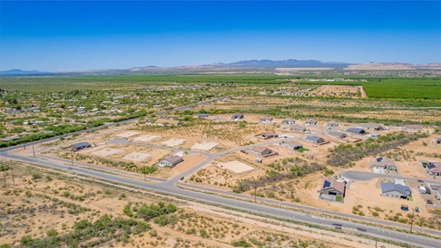 Welcome to Sahuarita Acres, where new homes by D.R. Horton offer the perfect blend of space, comfort, and modern convenience on expansive one-acre lots in the tranquil town of Sahuarita, Arizona. This unique community is designed for those who appreciate the luxury of space, with homes ranging from 1,900 to 2,600 square feet, each thoughtfully crafted with high-end finishes and features that cater to contemporary living. Sahuarita Acres provides a serene living experience with its spacious lots, perfect for creating your dream outdoor space. Whether you’re looking to park your RV, install a pool, or simply enjoy a large backyard, these one-acre homesites offer endless possibilities. The community also features walking trails that wind through the picturesque landscape, making it easy to enjoy the natural beauty of Sahuarita. Each home in Sahuarita Acres comes equipped with D.R. Horton’s Home is Connected® Smart Home package that includes a smart thermostat, video doorbell, keyless entry, a Wi-Fi-enabled garage door opener and more, ensuring that modern technology is at your fingertips. These new homes also new feature spray foam insulation for enhanced energy efficiency, RV parking with 30’ driveways, and three-car garages. Inside, you’ll find luxurious quartz countertops in the kitchens and bathrooms, 42” upper cabinets, dazzling wood-look tile flooring with thick 4 ¼ baseboards, and stainless steel appliances. These homes are also designed with energy efficiency in mind, meeting the stringent DOE Zero Energy Ready Home standards. This means your home is built to be so energy-efficient that a renewable energy system could offset most or all of the home's annual energy use, ensuring long-term savings and environmental benefits. Residents of Sahuarita Acres benefit from the peaceful, small-town charm of Sahuarita while still enjoying easy access to urban amenities. The community is just 30 minutes from downtown Tucson and only 15 miles from Davis-Monthan Air Force Base, making it an ideal location for those commuting to the city. Nearby, the Rancho Sahuarita shopping center offers a variety of dining and shopping options, including Fry’s, Dunkin’ Donuts, Starbucks, and more. Families will appreciate the excellent schools in the Sahuarita Unified School District, with Anza Trail Elementary, Anza Trail Middle School, and Walden Grove High School all located nearby. The community is also close to the popular Sahuarita Lake Park, which offers fishing, boating, and walking trails, providing ample opportunities for outdoor recreation. In addition to its scenic beauty and spacious homesites, Sahuarita Acres is close to several local attractions, including the Titan Missile Museum, Desert Diamond Casino, and the scenic Madera Canyon. Whether you’re looking to explore the outdoors or enjoy the quiet, laid-back vibe of Sahuarita, Sahuarita Acres offers a lifestyle that’s hard to match. Come home to Sahuarita Acres, where the perfect combination of space, luxury, and convenience awaits. Embrace the essence of Arizona living in this extraordinary community.