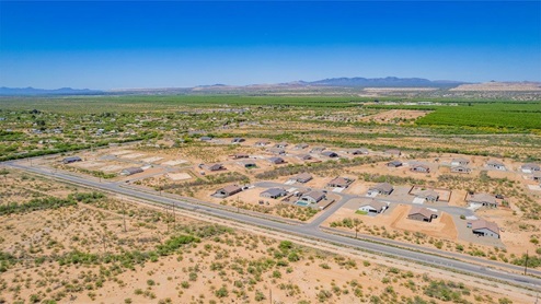 Welcome to Sahuarita Acres, where new homes by D.R. Horton offer the perfect blend of space, comfort, and modern convenience on expansive one-acre lots in the tranquil town of Sahuarita, Arizona. This unique community is designed for those who appreciate the luxury of space, with homes ranging from 1,900 to 2,600 square feet, each thoughtfully crafted with high-end finishes and features that cater to contemporary living. Sahuarita Acres provides a serene living experience with its spacious lots, perfect for creating your dream outdoor space. Whether you’re looking to park your RV, install a pool, or simply enjoy a large backyard, these one-acre homesites offer endless possibilities. The community also features walking trails that wind through the picturesque landscape, making it easy to enjoy the natural beauty of Sahuarita. Each home in Sahuarita Acres comes equipped with D.R. Horton’s Home is Connected® Smart Home package that includes a smart thermostat, video doorbell, keyless entry, a Wi-Fi-enabled garage door opener and more, ensuring that modern technology is at your fingertips. These new homes also new feature spray foam insulation for enhanced energy efficiency, RV parking with 30’ driveways, and three-car garages. Inside, you’ll find luxurious quartz countertops in the kitchens and bathrooms, 42” upper cabinets, dazzling wood-look tile flooring with thick 4 ¼ baseboards, and stainless steel appliances. These homes are also designed with energy efficiency in mind, meeting the stringent DOE Zero Energy Ready Home standards. This means your home is built to be so energy-efficient that a renewable energy system could offset most or all of the home's annual energy use, ensuring long-term savings and environmental benefits. Residents of Sahuarita Acres benefit from the peaceful, small-town charm of Sahuarita while still enjoying easy access to urban amenities. The community is just 30 minutes from downtown Tucson and only 15 miles from Davis-Monthan Air Force Base, making it an ideal location for those commuting to the city. Nearby, the Rancho Sahuarita shopping center offers a variety of dining and shopping options, including Fry’s, Dunkin’ Donuts, Starbucks, and more. Families will appreciate the excellent schools in the Sahuarita Unified School District, with Anza Trail Elementary, Anza Trail Middle School, and Walden Grove High School all located nearby. The community is also close to the popular Sahuarita Lake Park, which offers fishing, boating, and walking trails, providing ample opportunities for outdoor recreation. In addition to its scenic beauty and spacious homesites, Sahuarita Acres is close to several local attractions, including the Titan Missile Museum, Desert Diamond Casino, and the scenic Madera Canyon. Whether you’re looking to explore the outdoors or enjoy the quiet, laid-back vibe of Sahuarita, Sahuarita Acres offers a lifestyle that’s hard to match. Come home to Sahuarita Acres, where the perfect combination of space, luxury, and convenience awaits. Embrace the essence of Arizona living in this extraordinary community.