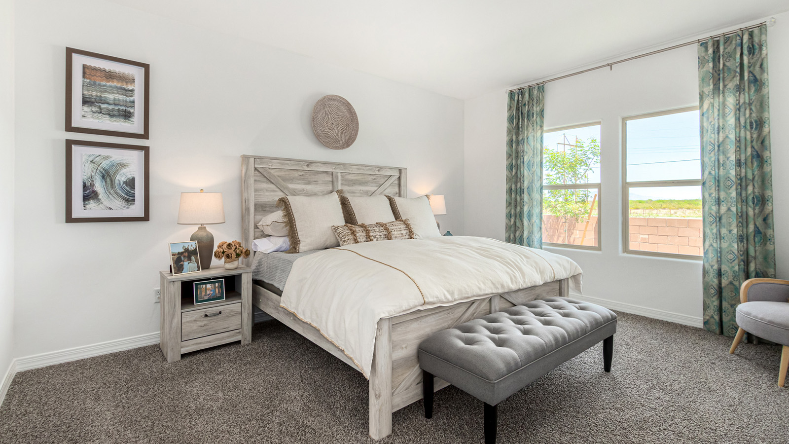 Introducing The Cali, a charming single-story new home located in the expansive Sahuarita Acres community. Covering 1,823 square feet, this home offers four bedrooms and two bathrooms, making it an excellent choice for families seeking both space and modern comfort.  As you step through the front porch and into the welcoming entryway, you’re immediately led into the heart of the home. The open-concept great room seamlessly connects to the dining area and kitchen, creating a perfect space for gathering with family and friends. The kitchen is a standout feature, boasting a central island, sleek granite countertops, and stylish 42” upper cabinets that offer ample storage. A spacious pantry adds to the kitchen’s functionality, ensuring everything you need is within reach.  The Cali’s layout is thoughtfully designed to maximize privacy and comfort. The primary bedroom, located at the rear of the home, features a large walk-in closet and an en-suite bathroom with dual sinks, providing a private space to start and end your day. The additional three bedrooms are situated toward the front of the home, each offering plenty of closet space and easy access to a full bathroom, making this layout ideal for families or guests.  One of the highlights of The Cali is the outdoor living space. The covered patio extends from the great room, offering an ideal spot to enjoy the expansive near one-acre lots that Sahuarita Acres is known for. Whether you’re planning to create a dream outdoor oasis or simply enjoy the natural surroundings, this space offers endless possibilities.  Built with modern living in mind, The Cali includes D.R. Horton’s Home is Connected® Smart Home package, featuring a smart thermostat, video doorbell, keyless entry, and a Wi-Fi-enabled garage door opener. Energy efficiency is also a priority, with spray foam insulation and designs that meet the DOE Zero Energy Ready Home standards, ensuring long-term savings and environmental benefits.  Located within the serene Sahuarita Acres community, residents of The Cali enjoy the luxury of space combined with easy access to urban amenities. With a three-car garage and RV parking on a 30’ driveway, this home is designed to accommodate your lifestyle while offering a peaceful retreat from the hustle and bustle.  Come home to The Cali, where comfort, style, and the beauty of Arizona living come together in perfect harmony.