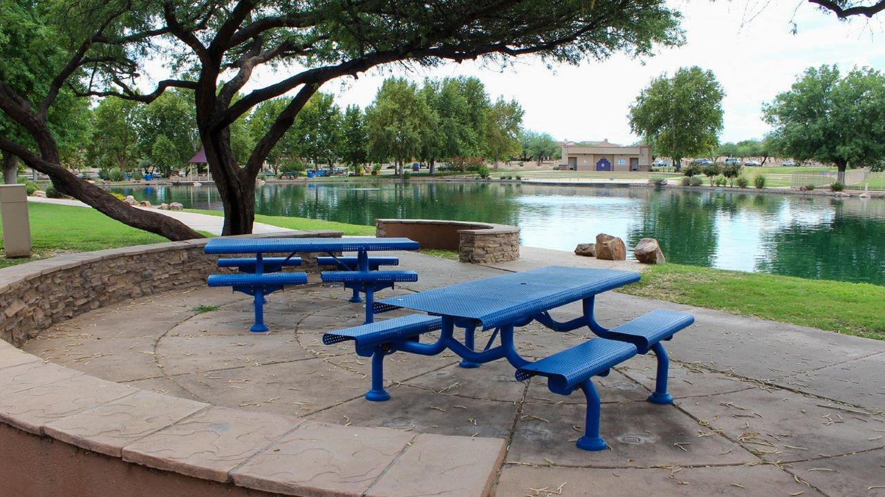 Introducing The Cali, a charming single-story new home located in the expansive Sahuarita Acres community. Covering 1,823 square feet, this home offers four bedrooms and two bathrooms, making it an excellent choice for families seeking both space and modern comfort.  As you step through the front porch and into the welcoming entryway, you’re immediately led into the heart of the home. The open-concept great room seamlessly connects to the dining area and kitchen, creating a perfect space for gathering with family and friends. The kitchen is a standout feature, boasting a central island, sleek granite countertops, and stylish 42” upper cabinets that offer ample storage. A spacious pantry adds to the kitchen’s functionality, ensuring everything you need is within reach.  The Cali’s layout is thoughtfully designed to maximize privacy and comfort. The primary bedroom, located at the rear of the home, features a large walk-in closet and an en-suite bathroom with dual sinks, providing a private space to start and end your day. The additional three bedrooms are situated toward the front of the home, each offering plenty of closet space and easy access to a full bathroom, making this layout ideal for families or guests.  One of the highlights of The Cali is the outdoor living space. The covered patio extends from the great room, offering an ideal spot to enjoy the expansive near one-acre lots that Sahuarita Acres is known for. Whether you’re planning to create a dream outdoor oasis or simply enjoy the natural surroundings, this space offers endless possibilities.  Built with modern living in mind, The Cali includes D.R. Horton’s Home is Connected® Smart Home package, featuring a smart thermostat, video doorbell, keyless entry, and a Wi-Fi-enabled garage door opener. Energy efficiency is also a priority, with spray foam insulation and designs that meet the DOE Zero Energy Ready Home standards, ensuring long-term savings and environmental benefits.  Located within the serene Sahuarita Acres community, residents of The Cali enjoy the luxury of space combined with easy access to urban amenities. With a three-car garage and RV parking on a 30’ driveway, this home is designed to accommodate your lifestyle while offering a peaceful retreat from the hustle and bustle.  Come home to The Cali, where comfort, style, and the beauty of Arizona living come together in perfect harmony.