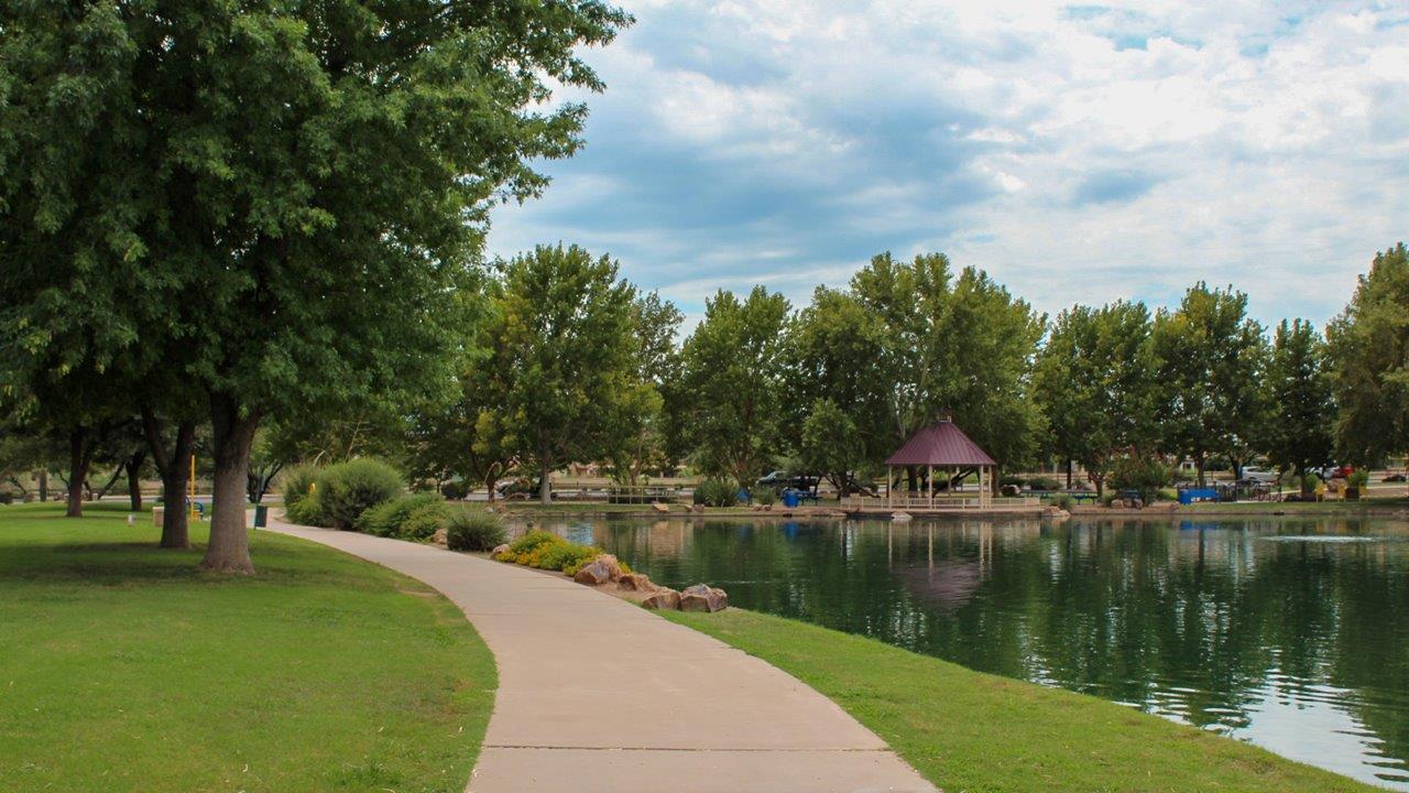 Introducing The Cali, a charming single-story new home located in the expansive Sahuarita Acres community. Covering 1,823 square feet, this home offers four bedrooms and two bathrooms, making it an excellent choice for families seeking both space and modern comfort.  As you step through the front porch and into the welcoming entryway, you’re immediately led into the heart of the home. The open-concept great room seamlessly connects to the dining area and kitchen, creating a perfect space for gathering with family and friends. The kitchen is a standout feature, boasting a central island, sleek granite countertops, and stylish 42” upper cabinets that offer ample storage. A spacious pantry adds to the kitchen’s functionality, ensuring everything you need is within reach.  The Cali’s layout is thoughtfully designed to maximize privacy and comfort. The primary bedroom, located at the rear of the home, features a large walk-in closet and an en-suite bathroom with dual sinks, providing a private space to start and end your day. The additional three bedrooms are situated toward the front of the home, each offering plenty of closet space and easy access to a full bathroom, making this layout ideal for families or guests.  One of the highlights of The Cali is the outdoor living space. The covered patio extends from the great room, offering an ideal spot to enjoy the expansive near one-acre lots that Sahuarita Acres is known for. Whether you’re planning to create a dream outdoor oasis or simply enjoy the natural surroundings, this space offers endless possibilities.  Built with modern living in mind, The Cali includes D.R. Horton’s Home is Connected® Smart Home package, featuring a smart thermostat, video doorbell, keyless entry, and a Wi-Fi-enabled garage door opener. Energy efficiency is also a priority, with spray foam insulation and designs that meet the DOE Zero Energy Ready Home standards, ensuring long-term savings and environmental benefits.  Located within the serene Sahuarita Acres community, residents of The Cali enjoy the luxury of space combined with easy access to urban amenities. With a three-car garage and RV parking on a 30’ driveway, this home is designed to accommodate your lifestyle while offering a peaceful retreat from the hustle and bustle.  Come home to The Cali, where comfort, style, and the beauty of Arizona living come together in perfect harmony.