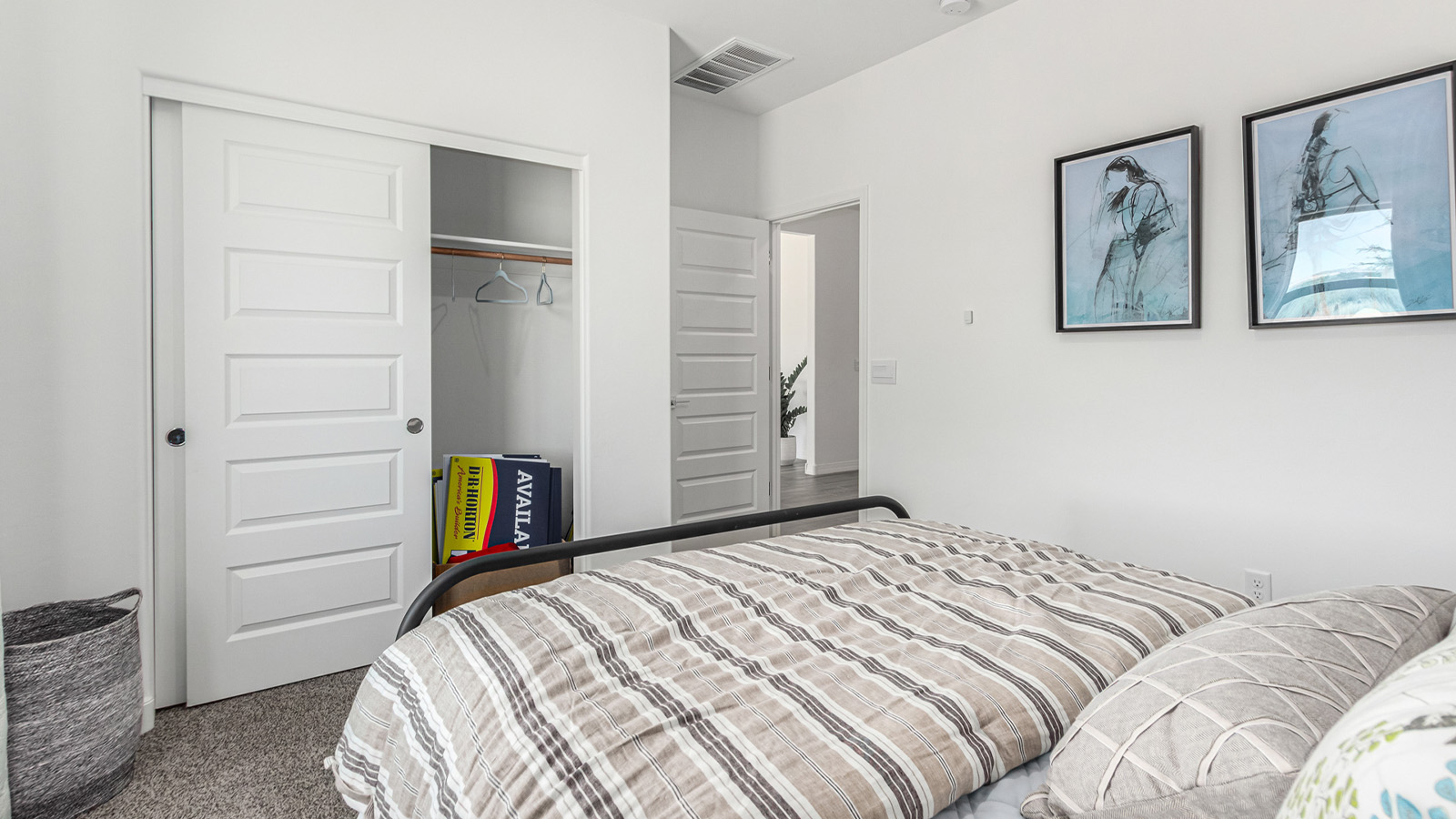 Introducing The Cali, a charming single-story new home located in the expansive Sahuarita Acres community. Covering 1,823 square feet, this home offers four bedrooms and two bathrooms, making it an excellent choice for families seeking both space and modern comfort.  As you step through the front porch and into the welcoming entryway, you’re immediately led into the heart of the home. The open-concept great room seamlessly connects to the dining area and kitchen, creating a perfect space for gathering with family and friends. The kitchen is a standout feature, boasting a central island, sleek granite countertops, and stylish 42” upper cabinets that offer ample storage. A spacious pantry adds to the kitchen’s functionality, ensuring everything you need is within reach.  The Cali’s layout is thoughtfully designed to maximize privacy and comfort. The primary bedroom, located at the rear of the home, features a large walk-in closet and an en-suite bathroom with dual sinks, providing a private space to start and end your day. The additional three bedrooms are situated toward the front of the home, each offering plenty of closet space and easy access to a full bathroom, making this layout ideal for families or guests.  One of the highlights of The Cali is the outdoor living space. The covered patio extends from the great room, offering an ideal spot to enjoy the expansive near one-acre lots that Sahuarita Acres is known for. Whether you’re planning to create a dream outdoor oasis or simply enjoy the natural surroundings, this space offers endless possibilities.  Built with modern living in mind, The Cali includes D.R. Horton’s Home is Connected® Smart Home package, featuring a smart thermostat, video doorbell, keyless entry, and a Wi-Fi-enabled garage door opener. Energy efficiency is also a priority, with spray foam insulation and designs that meet the DOE Zero Energy Ready Home standards, ensuring long-term savings and environmental benefits.  Located within the serene Sahuarita Acres community, residents of The Cali enjoy the luxury of space combined with easy access to urban amenities. With a three-car garage and RV parking on a 30’ driveway, this home is designed to accommodate your lifestyle while offering a peaceful retreat from the hustle and bustle.  Come home to The Cali, where comfort, style, and the beauty of Arizona living come together in perfect harmony.