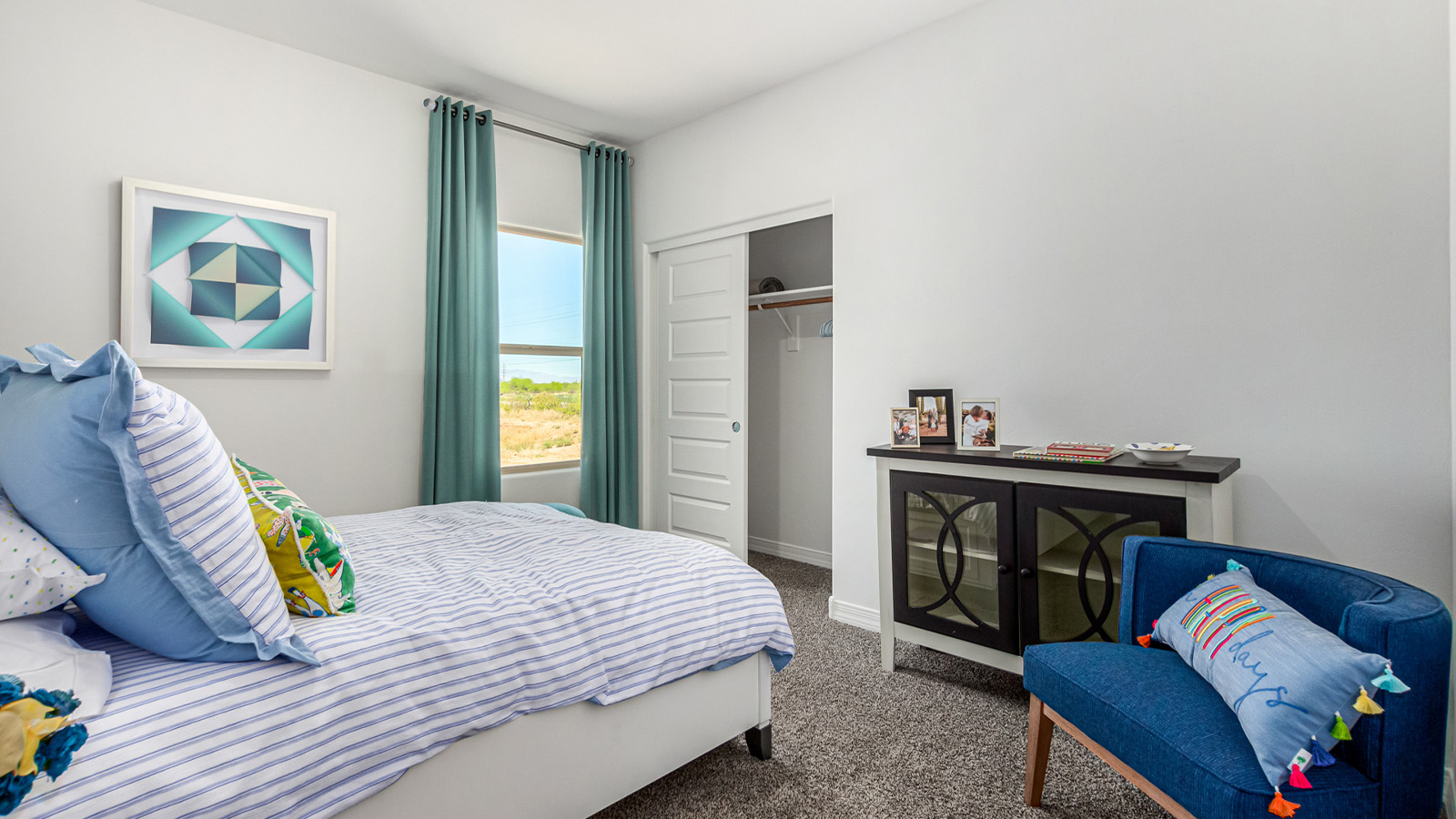 Introducing The Cali, a charming single-story new home located in the expansive Sahuarita Acres community. Covering 1,823 square feet, this home offers four bedrooms and two bathrooms, making it an excellent choice for families seeking both space and modern comfort.  As you step through the front porch and into the welcoming entryway, you’re immediately led into the heart of the home. The open-concept great room seamlessly connects to the dining area and kitchen, creating a perfect space for gathering with family and friends. The kitchen is a standout feature, boasting a central island, sleek granite countertops, and stylish 42” upper cabinets that offer ample storage. A spacious pantry adds to the kitchen’s functionality, ensuring everything you need is within reach.  The Cali’s layout is thoughtfully designed to maximize privacy and comfort. The primary bedroom, located at the rear of the home, features a large walk-in closet and an en-suite bathroom with dual sinks, providing a private space to start and end your day. The additional three bedrooms are situated toward the front of the home, each offering plenty of closet space and easy access to a full bathroom, making this layout ideal for families or guests.  One of the highlights of The Cali is the outdoor living space. The covered patio extends from the great room, offering an ideal spot to enjoy the expansive near one-acre lots that Sahuarita Acres is known for. Whether you’re planning to create a dream outdoor oasis or simply enjoy the natural surroundings, this space offers endless possibilities.  Built with modern living in mind, The Cali includes D.R. Horton’s Home is Connected® Smart Home package, featuring a smart thermostat, video doorbell, keyless entry, and a Wi-Fi-enabled garage door opener. Energy efficiency is also a priority, with spray foam insulation and designs that meet the DOE Zero Energy Ready Home standards, ensuring long-term savings and environmental benefits.  Located within the serene Sahuarita Acres community, residents of The Cali enjoy the luxury of space combined with easy access to urban amenities. With a three-car garage and RV parking on a 30’ driveway, this home is designed to accommodate your lifestyle while offering a peaceful retreat from the hustle and bustle.  Come home to The Cali, where comfort, style, and the beauty of Arizona living come together in perfect harmony.