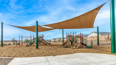 Welcome to Tortolita Trails, where new homes by D.R. Horton blend luxury and nature in the prestigious Dove Mountain area of Marana, Arizona. This exclusive community offers a serene living experience with only 82 homesites spread across 30 spacious acres, ensuring a low-density environment that provides ample privacy and tranquility. Surrounded by breathtaking 360-degree views of the Tortolita and Catalina Mountains, Tortolita Trails is a nature lover’s dream, with easy access to numerous trailheads, parks, and outdoor activities. Tortolita Trails features six charming single-story floor plans, ranging from 1,400 to 1,900 square feet, each crafted with high-quality finishes and modern amenities. Homes in this community feature spacious lots, beautiful Spanish lace stucco exteriors, tile roofs, and exquisitely landscaped front yards with auto drip irrigation. Inside, you’ll find luxurious quartz countertops in the kitchens and bathrooms, tile shower walls, 42” shaker-style cabinets, and stunning wood-look tile flooring throughout the main living areas. Each home is designed for comfort and convenience, with 9-foot ceilings, recessed lighting, and a Home is Connected® Smart Home package that includes a smart thermostat, video doorbell, keyless entry, a Wi-Fi-enabled garage door opener and more. These homes are not only stylish but also energy-efficient, meeting the stringent DOE Zero Energy Ready Home standards. Equipped with tankless water heaters, energy-efficient LED lighting, and advanced spray foam insulation, these homes are designed to reduce your environmental footprint while providing long-term savings on energy costs. Additionally, each home includes a single basin stainless steel kitchen sink with a water filtration system and a soft water loop for enhanced water quality. Living in Tortolita Trails means being part of a community that values both elegance and connection to nature. The community offers a range of amenities, including a park, playground, walking paths, ramadas, and grassy areas with picnic benches, perfect for family gatherings and outdoor activities. The prestigious Golf Club at Dove Mountain and the 5-star Ritz Carlton Resort are just minutes away, offering world-class golfing, dining, and spa experiences. Families will appreciate the top-rated Marana Unified School District, with the highly-rated Dove Mountain CSTEM K-8 School within walking distance. The community’s location also provides easy access to shopping, dining, and entertainment, with the nearby Houghton Town Center and Tangerine Sky Community Park offering everything you need just a short drive away. For outdoor enthusiasts, Tortolita Trails is surrounded by natural beauty and endless recreational opportunities. Explore the 29 miles of trails at Tortolita Mountain Park, or visit the nearby Tortolita Preserve, a 2,400-acre expanse of untouched desert perfect for hiking, biking, and wildlife viewing. The community’s proximity to Saguaro National Park and the Camino Loma Alta Bike Trail further enhances its appeal to those who love the outdoors. Come home to Tortolita Trails, where the fusion of elegant living and natural splendor creates an unparalleled lifestyle. Embrace the essence of Arizona living at its finest in this extraordinary community.