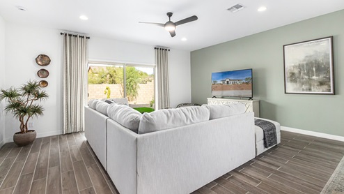 Welcome to Tortolita Trails, where new homes by D.R. Horton blend luxury and nature in the prestigious Dove Mountain area of Marana, Arizona. This exclusive community offers a serene living experience with only 82 homesites spread across 30 spacious acres, ensuring a low-density environment that provides ample privacy and tranquility. Surrounded by breathtaking 360-degree views of the Tortolita and Catalina Mountains, Tortolita Trails is a nature lover’s dream, with easy access to numerous trailheads, parks, and outdoor activities. Tortolita Trails features six charming single-story floor plans, ranging from 1,400 to 1,900 square feet, each crafted with high-quality finishes and modern amenities. Homes in this community feature spacious lots, beautiful Spanish lace stucco exteriors, tile roofs, and exquisitely landscaped front yards with auto drip irrigation. Inside, you’ll find luxurious quartz countertops in the kitchens and bathrooms, tile shower walls, 42” shaker-style cabinets, and stunning wood-look tile flooring throughout the main living areas. Each home is designed for comfort and convenience, with 9-foot ceilings, recessed lighting, and a Home is Connected® Smart Home package that includes a smart thermostat, video doorbell, keyless entry, a Wi-Fi-enabled garage door opener and more. These homes are not only stylish but also energy-efficient, meeting the stringent DOE Zero Energy Ready Home standards. Equipped with tankless water heaters, energy-efficient LED lighting, and advanced spray foam insulation, these homes are designed to reduce your environmental footprint while providing long-term savings on energy costs. Additionally, each home includes a single basin stainless steel kitchen sink with a water filtration system and a soft water loop for enhanced water quality. Living in Tortolita Trails means being part of a community that values both elegance and connection to nature. The community offers a range of amenities, including a park, playground, walking paths, ramadas, and grassy areas with picnic benches, perfect for family gatherings and outdoor activities. The prestigious Golf Club at Dove Mountain and the 5-star Ritz Carlton Resort are just minutes away, offering world-class golfing, dining, and spa experiences. Families will appreciate the top-rated Marana Unified School District, with the highly-rated Dove Mountain CSTEM K-8 School within walking distance. The community’s location also provides easy access to shopping, dining, and entertainment, with the nearby Houghton Town Center and Tangerine Sky Community Park offering everything you need just a short drive away. For outdoor enthusiasts, Tortolita Trails is surrounded by natural beauty and endless recreational opportunities. Explore the 29 miles of trails at Tortolita Mountain Park, or visit the nearby Tortolita Preserve, a 2,400-acre expanse of untouched desert perfect for hiking, biking, and wildlife viewing. The community’s proximity to Saguaro National Park and the Camino Loma Alta Bike Trail further enhances its appeal to those who love the outdoors. Come home to Tortolita Trails, where the fusion of elegant living and natural splendor creates an unparalleled lifestyle. Embrace the essence of Arizona living at its finest in this extraordinary community.