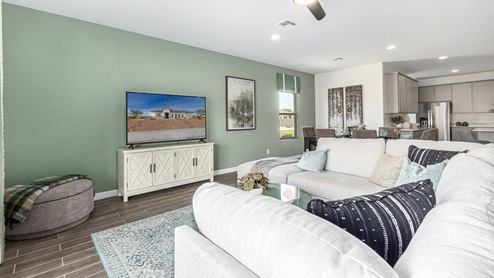 Welcome to Tortolita Trails, where new homes by D.R. Horton blend luxury and nature in the prestigious Dove Mountain area of Marana, Arizona. This exclusive community offers a serene living experience with only 82 homesites spread across 30 spacious acres, ensuring a low-density environment that provides ample privacy and tranquility. Surrounded by breathtaking 360-degree views of the Tortolita and Catalina Mountains, Tortolita Trails is a nature lover’s dream, with easy access to numerous trailheads, parks, and outdoor activities. Tortolita Trails features six charming single-story floor plans, ranging from 1,400 to 1,900 square feet, each crafted with high-quality finishes and modern amenities. Homes in this community feature spacious lots, beautiful Spanish lace stucco exteriors, tile roofs, and exquisitely landscaped front yards with auto drip irrigation. Inside, you’ll find luxurious quartz countertops in the kitchens and bathrooms, tile shower walls, 42” shaker-style cabinets, and stunning wood-look tile flooring throughout the main living areas. Each home is designed for comfort and convenience, with 9-foot ceilings, recessed lighting, and a Home is Connected® Smart Home package that includes a smart thermostat, video doorbell, keyless entry, a Wi-Fi-enabled garage door opener and more. These homes are not only stylish but also energy-efficient, meeting the stringent DOE Zero Energy Ready Home standards. Equipped with tankless water heaters, energy-efficient LED lighting, and advanced spray foam insulation, these homes are designed to reduce your environmental footprint while providing long-term savings on energy costs. Additionally, each home includes a single basin stainless steel kitchen sink with a water filtration system and a soft water loop for enhanced water quality. Living in Tortolita Trails means being part of a community that values both elegance and connection to nature. The community offers a range of amenities, including a park, playground, walking paths, ramadas, and grassy areas with picnic benches, perfect for family gatherings and outdoor activities. The prestigious Golf Club at Dove Mountain and the 5-star Ritz Carlton Resort are just minutes away, offering world-class golfing, dining, and spa experiences. Families will appreciate the top-rated Marana Unified School District, with the highly-rated Dove Mountain CSTEM K-8 School within walking distance. The community’s location also provides easy access to shopping, dining, and entertainment, with the nearby Houghton Town Center and Tangerine Sky Community Park offering everything you need just a short drive away. For outdoor enthusiasts, Tortolita Trails is surrounded by natural beauty and endless recreational opportunities. Explore the 29 miles of trails at Tortolita Mountain Park, or visit the nearby Tortolita Preserve, a 2,400-acre expanse of untouched desert perfect for hiking, biking, and wildlife viewing. The community’s proximity to Saguaro National Park and the Camino Loma Alta Bike Trail further enhances its appeal to those who love the outdoors. Come home to Tortolita Trails, where the fusion of elegant living and natural splendor creates an unparalleled lifestyle. Embrace the essence of Arizona living at its finest in this extraordinary community.