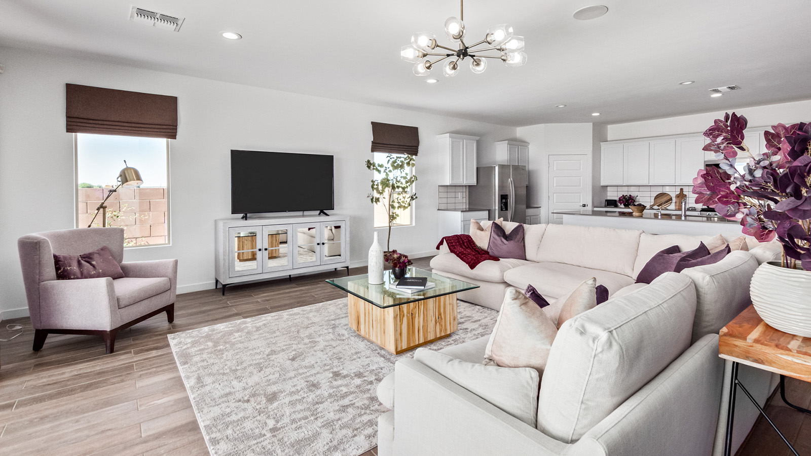 Introducing The Citrine, the crown jewel and largest floorplan within the Tortolita Trails community, located in the scenic Dove Mountain area of Marana, Arizona. Spanning 2,577 square feet, this impressive single-story new home offers a blend of space, style, and contemporary convenience, perfect for families seeking room to grow and entertain.  As you step through the welcoming entryway, you’re immediately drawn into the expansive great room, which flows comfortably into the dining area and kitchen. This open layout creates a warm and inviting atmosphere, ideal for both casual family dinners and larger gatherings. The kitchen is a chef's delight, complete with a spacious island, high-end quartz countertops, and ample storage within the 42” shaker-style cabinets. Adjacent to the kitchen, a cozy nook provides the perfect spot for morning coffee while enjoying views of the backyard.  The Citrine boasts five well-appointed bedrooms, providing flexibility for various lifestyle needs. The primary bedroom is situated at the rear of the home for added privacy, featuring a generous walk-in closet and a luxurious en-suite bathroom with dual sinks and a tiled shower. The additional four bedrooms are thoughtfully distributed throughout the home, offering comfort and convenience for guests or family members.  Outdoor living is a key feature of The Citrine, with a covered patio that extends the living space into the backyard, perfect for al fresco dining or simply relaxing in the shade. The two-car garage not only provides ample space for vehicles but also includes additional storage options to keep your home organized.  Energy efficiency and modern technology are at the forefront of The Citrine’s design. The home is equipped with tankless water heaters, energy-efficient LED lighting, and advanced spray foam insulation, all meeting the stringent DOE Zero Energy Ready Home standards. A Home is Connected® Smart Home package further enhances everyday living, with features like a smart thermostat, video doorbell, keyless entry, a Wi-Fi-enabled garage door opener and more.   As the largest floorplan within Tortolita Trails, The Citrine stands out not only for its size but also for its intentional layout and premium finishes. This home offers an unparalleled living experience in a community that embraces both elegance and a deep connection to nature. With easy access to outdoor activities, top-rated schools, and upscale amenities, The Citrine provides the perfect blend of comfort, style, and convenience in one of Arizona's most desirable neighborhoods.