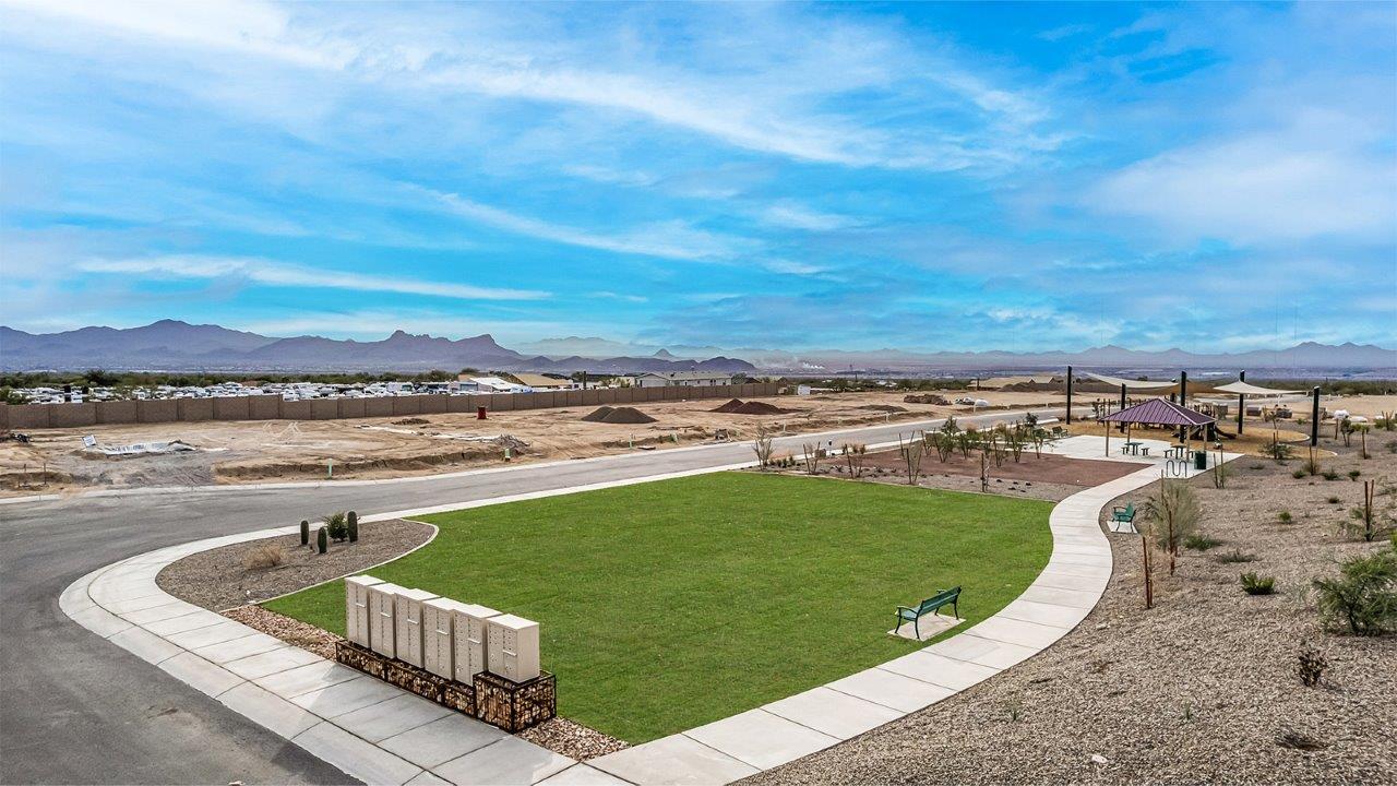 Introducing The Citrine, the crown jewel and largest floorplan within the Tortolita Trails community, located in the scenic Dove Mountain area of Marana, Arizona. Spanning 2,577 square feet, this impressive single-story new home offers a blend of space, style, and contemporary convenience, perfect for families seeking room to grow and entertain.  As you step through the welcoming entryway, you’re immediately drawn into the expansive great room, which flows comfortably into the dining area and kitchen. This open layout creates a warm and inviting atmosphere, ideal for both casual family dinners and larger gatherings. The kitchen is a chef's delight, complete with a spacious island, high-end quartz countertops, and ample storage within the 42” shaker-style cabinets. Adjacent to the kitchen, a cozy nook provides the perfect spot for morning coffee while enjoying views of the backyard.  The Citrine boasts five well-appointed bedrooms, providing flexibility for various lifestyle needs. The primary bedroom is situated at the rear of the home for added privacy, featuring a generous walk-in closet and a luxurious en-suite bathroom with dual sinks and a tiled shower. The additional four bedrooms are thoughtfully distributed throughout the home, offering comfort and convenience for guests or family members.  Outdoor living is a key feature of The Citrine, with a covered patio that extends the living space into the backyard, perfect for al fresco dining or simply relaxing in the shade. The two-car garage not only provides ample space for vehicles but also includes additional storage options to keep your home organized.  Energy efficiency and modern technology are at the forefront of The Citrine’s design. The home is equipped with tankless water heaters, energy-efficient LED lighting, and advanced spray foam insulation, all meeting the stringent DOE Zero Energy Ready Home standards. A Home is Connected® Smart Home package further enhances everyday living, with features like a smart thermostat, video doorbell, keyless entry, a Wi-Fi-enabled garage door opener and more.   As the largest floorplan within Tortolita Trails, The Citrine stands out not only for its size but also for its intentional layout and premium finishes. This home offers an unparalleled living experience in a community that embraces both elegance and a deep connection to nature. With easy access to outdoor activities, top-rated schools, and upscale amenities, The Citrine provides the perfect blend of comfort, style, and convenience in one of Arizona's most desirable neighborhoods.