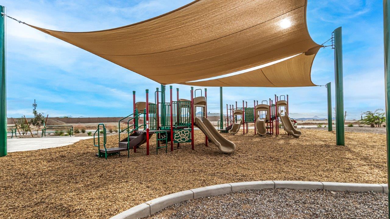 Introducing The Citrine, the crown jewel and largest floorplan within the Tortolita Trails community, located in the scenic Dove Mountain area of Marana, Arizona. Spanning 2,577 square feet, this impressive single-story new home offers a blend of space, style, and contemporary convenience, perfect for families seeking room to grow and entertain.  As you step through the welcoming entryway, you’re immediately drawn into the expansive great room, which flows comfortably into the dining area and kitchen. This open layout creates a warm and inviting atmosphere, ideal for both casual family dinners and larger gatherings. The kitchen is a chef's delight, complete with a spacious island, high-end quartz countertops, and ample storage within the 42” shaker-style cabinets. Adjacent to the kitchen, a cozy nook provides the perfect spot for morning coffee while enjoying views of the backyard.  The Citrine boasts five well-appointed bedrooms, providing flexibility for various lifestyle needs. The primary bedroom is situated at the rear of the home for added privacy, featuring a generous walk-in closet and a luxurious en-suite bathroom with dual sinks and a tiled shower. The additional four bedrooms are thoughtfully distributed throughout the home, offering comfort and convenience for guests or family members.  Outdoor living is a key feature of The Citrine, with a covered patio that extends the living space into the backyard, perfect for al fresco dining or simply relaxing in the shade. The two-car garage not only provides ample space for vehicles but also includes additional storage options to keep your home organized.  Energy efficiency and modern technology are at the forefront of The Citrine’s design. The home is equipped with tankless water heaters, energy-efficient LED lighting, and advanced spray foam insulation, all meeting the stringent DOE Zero Energy Ready Home standards. A Home is Connected® Smart Home package further enhances everyday living, with features like a smart thermostat, video doorbell, keyless entry, a Wi-Fi-enabled garage door opener and more.   As the largest floorplan within Tortolita Trails, The Citrine stands out not only for its size but also for its intentional layout and premium finishes. This home offers an unparalleled living experience in a community that embraces both elegance and a deep connection to nature. With easy access to outdoor activities, top-rated schools, and upscale amenities, The Citrine provides the perfect blend of comfort, style, and convenience in one of Arizona's most desirable neighborhoods.