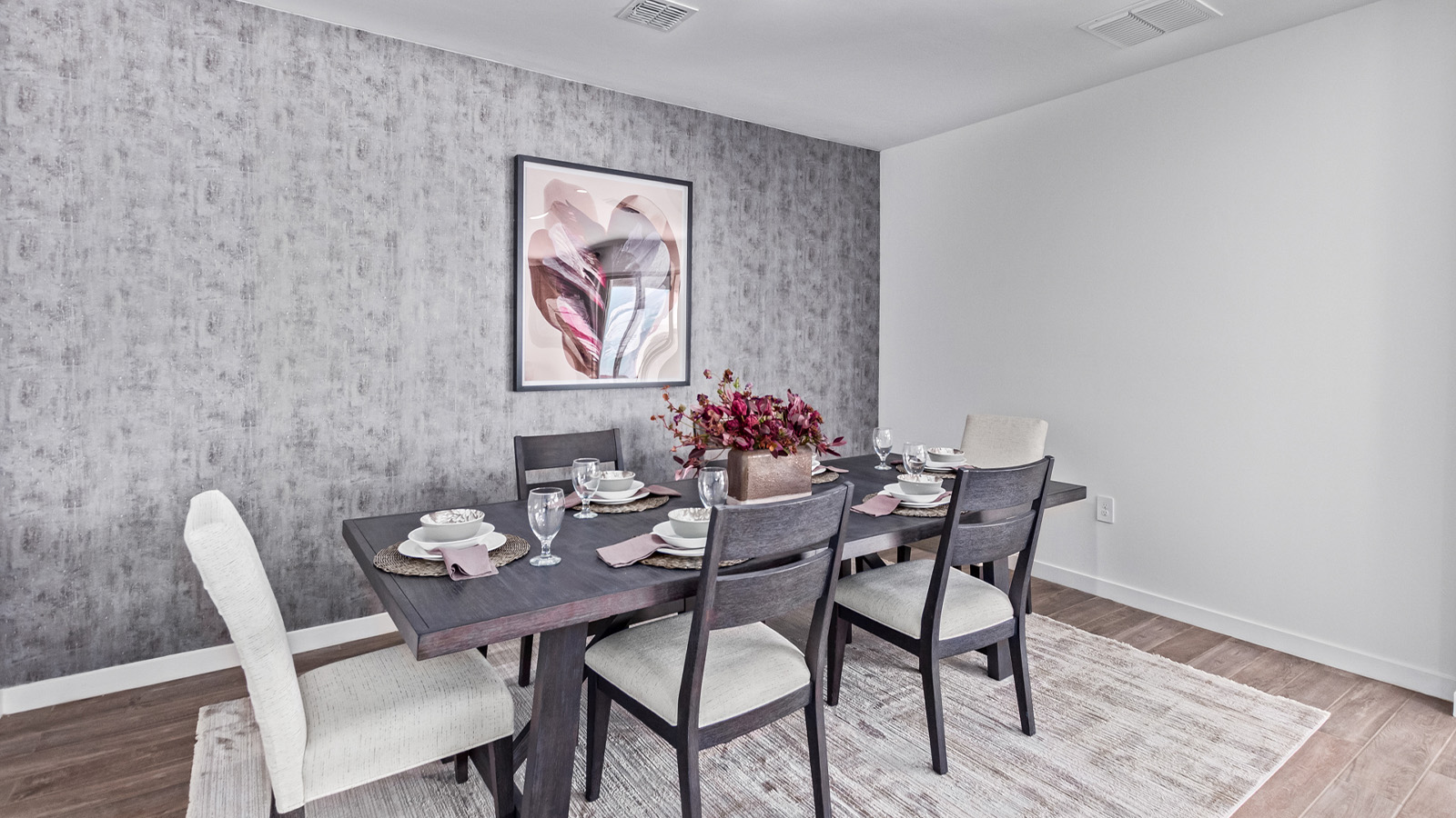 Introducing The Citrine, the crown jewel and largest floorplan within the Tortolita Trails community, located in the scenic Dove Mountain area of Marana, Arizona. Spanning 2,577 square feet, this impressive single-story new home offers a blend of space, style, and contemporary convenience, perfect for families seeking room to grow and entertain.  As you step through the welcoming entryway, you’re immediately drawn into the expansive great room, which flows comfortably into the dining area and kitchen. This open layout creates a warm and inviting atmosphere, ideal for both casual family dinners and larger gatherings. The kitchen is a chef's delight, complete with a spacious island, high-end quartz countertops, and ample storage within the 42” shaker-style cabinets. Adjacent to the kitchen, a cozy nook provides the perfect spot for morning coffee while enjoying views of the backyard.  The Citrine boasts five well-appointed bedrooms, providing flexibility for various lifestyle needs. The primary bedroom is situated at the rear of the home for added privacy, featuring a generous walk-in closet and a luxurious en-suite bathroom with dual sinks and a tiled shower. The additional four bedrooms are thoughtfully distributed throughout the home, offering comfort and convenience for guests or family members.  Outdoor living is a key feature of The Citrine, with a covered patio that extends the living space into the backyard, perfect for al fresco dining or simply relaxing in the shade. The two-car garage not only provides ample space for vehicles but also includes additional storage options to keep your home organized.  Energy efficiency and modern technology are at the forefront of The Citrine’s design. The home is equipped with tankless water heaters, energy-efficient LED lighting, and advanced spray foam insulation, all meeting the stringent DOE Zero Energy Ready Home standards. A Home is Connected® Smart Home package further enhances everyday living, with features like a smart thermostat, video doorbell, keyless entry, a Wi-Fi-enabled garage door opener and more.   As the largest floorplan within Tortolita Trails, The Citrine stands out not only for its size but also for its intentional layout and premium finishes. This home offers an unparalleled living experience in a community that embraces both elegance and a deep connection to nature. With easy access to outdoor activities, top-rated schools, and upscale amenities, The Citrine provides the perfect blend of comfort, style, and convenience in one of Arizona's most desirable neighborhoods.