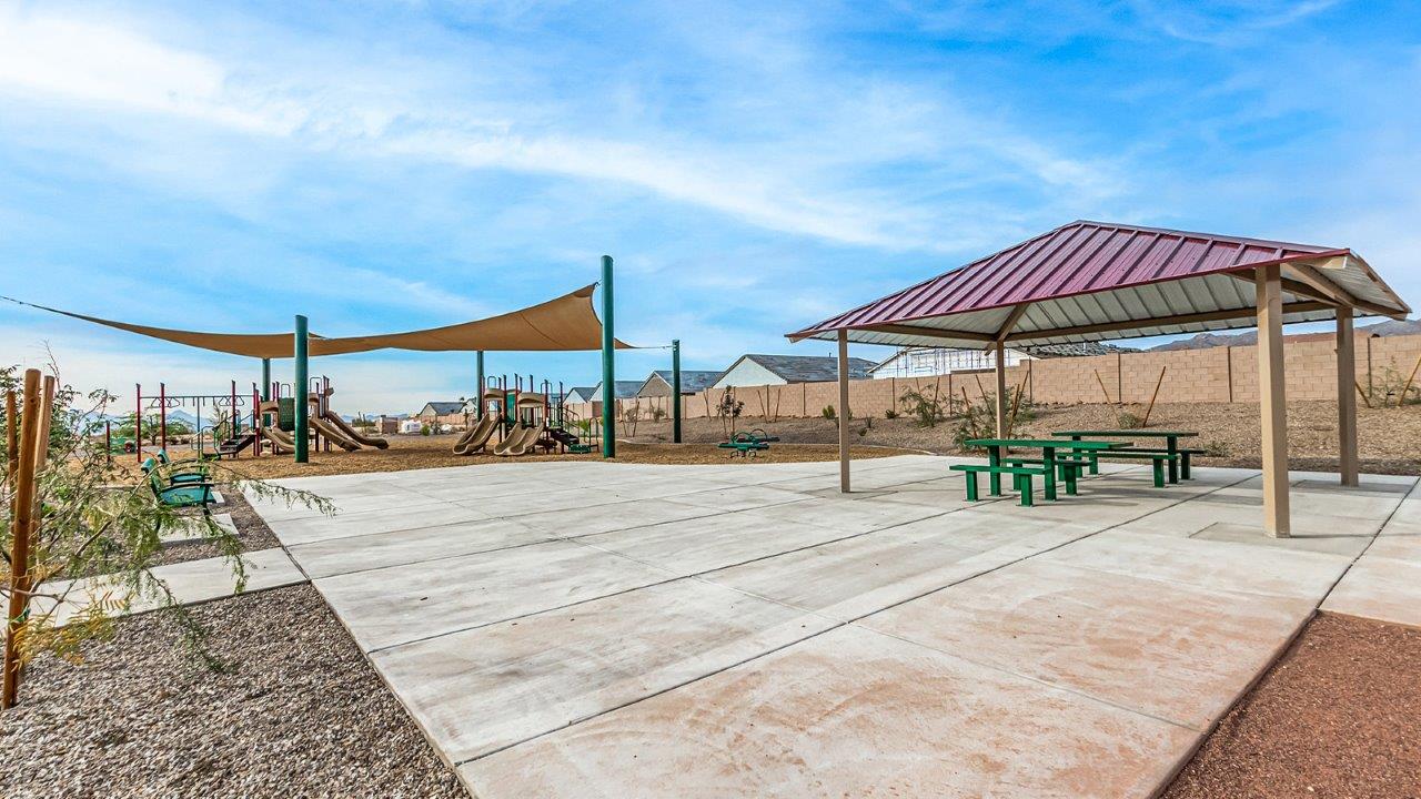 Introducing The Citrine, the crown jewel and largest floorplan within the Tortolita Trails community, located in the scenic Dove Mountain area of Marana, Arizona. Spanning 2,577 square feet, this impressive single-story new home offers a blend of space, style, and contemporary convenience, perfect for families seeking room to grow and entertain.  As you step through the welcoming entryway, you’re immediately drawn into the expansive great room, which flows comfortably into the dining area and kitchen. This open layout creates a warm and inviting atmosphere, ideal for both casual family dinners and larger gatherings. The kitchen is a chef's delight, complete with a spacious island, high-end quartz countertops, and ample storage within the 42” shaker-style cabinets. Adjacent to the kitchen, a cozy nook provides the perfect spot for morning coffee while enjoying views of the backyard.  The Citrine boasts five well-appointed bedrooms, providing flexibility for various lifestyle needs. The primary bedroom is situated at the rear of the home for added privacy, featuring a generous walk-in closet and a luxurious en-suite bathroom with dual sinks and a tiled shower. The additional four bedrooms are thoughtfully distributed throughout the home, offering comfort and convenience for guests or family members.  Outdoor living is a key feature of The Citrine, with a covered patio that extends the living space into the backyard, perfect for al fresco dining or simply relaxing in the shade. The two-car garage not only provides ample space for vehicles but also includes additional storage options to keep your home organized.  Energy efficiency and modern technology are at the forefront of The Citrine’s design. The home is equipped with tankless water heaters, energy-efficient LED lighting, and advanced spray foam insulation, all meeting the stringent DOE Zero Energy Ready Home standards. A Home is Connected® Smart Home package further enhances everyday living, with features like a smart thermostat, video doorbell, keyless entry, a Wi-Fi-enabled garage door opener and more.   As the largest floorplan within Tortolita Trails, The Citrine stands out not only for its size but also for its intentional layout and premium finishes. This home offers an unparalleled living experience in a community that embraces both elegance and a deep connection to nature. With easy access to outdoor activities, top-rated schools, and upscale amenities, The Citrine provides the perfect blend of comfort, style, and convenience in one of Arizona's most desirable neighborhoods.