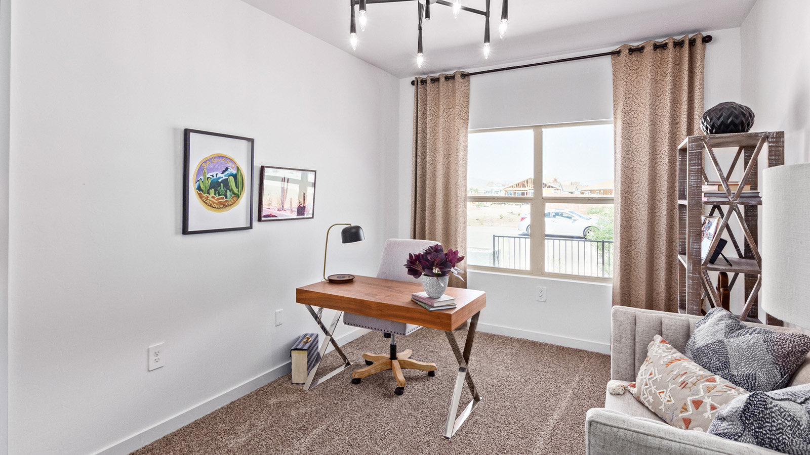 Introducing The Citrine, the crown jewel and largest floorplan within the Tortolita Trails community, located in the scenic Dove Mountain area of Marana, Arizona. Spanning 2,577 square feet, this impressive single-story new home offers a blend of space, style, and contemporary convenience, perfect for families seeking room to grow and entertain.  As you step through the welcoming entryway, you’re immediately drawn into the expansive great room, which flows comfortably into the dining area and kitchen. This open layout creates a warm and inviting atmosphere, ideal for both casual family dinners and larger gatherings. The kitchen is a chef's delight, complete with a spacious island, high-end quartz countertops, and ample storage within the 42” shaker-style cabinets. Adjacent to the kitchen, a cozy nook provides the perfect spot for morning coffee while enjoying views of the backyard.  The Citrine boasts five well-appointed bedrooms, providing flexibility for various lifestyle needs. The primary bedroom is situated at the rear of the home for added privacy, featuring a generous walk-in closet and a luxurious en-suite bathroom with dual sinks and a tiled shower. The additional four bedrooms are thoughtfully distributed throughout the home, offering comfort and convenience for guests or family members.  Outdoor living is a key feature of The Citrine, with a covered patio that extends the living space into the backyard, perfect for al fresco dining or simply relaxing in the shade. The two-car garage not only provides ample space for vehicles but also includes additional storage options to keep your home organized.  Energy efficiency and modern technology are at the forefront of The Citrine’s design. The home is equipped with tankless water heaters, energy-efficient LED lighting, and advanced spray foam insulation, all meeting the stringent DOE Zero Energy Ready Home standards. A Home is Connected® Smart Home package further enhances everyday living, with features like a smart thermostat, video doorbell, keyless entry, a Wi-Fi-enabled garage door opener and more.   As the largest floorplan within Tortolita Trails, The Citrine stands out not only for its size but also for its intentional layout and premium finishes. This home offers an unparalleled living experience in a community that embraces both elegance and a deep connection to nature. With easy access to outdoor activities, top-rated schools, and upscale amenities, The Citrine provides the perfect blend of comfort, style, and convenience in one of Arizona's most desirable neighborhoods.