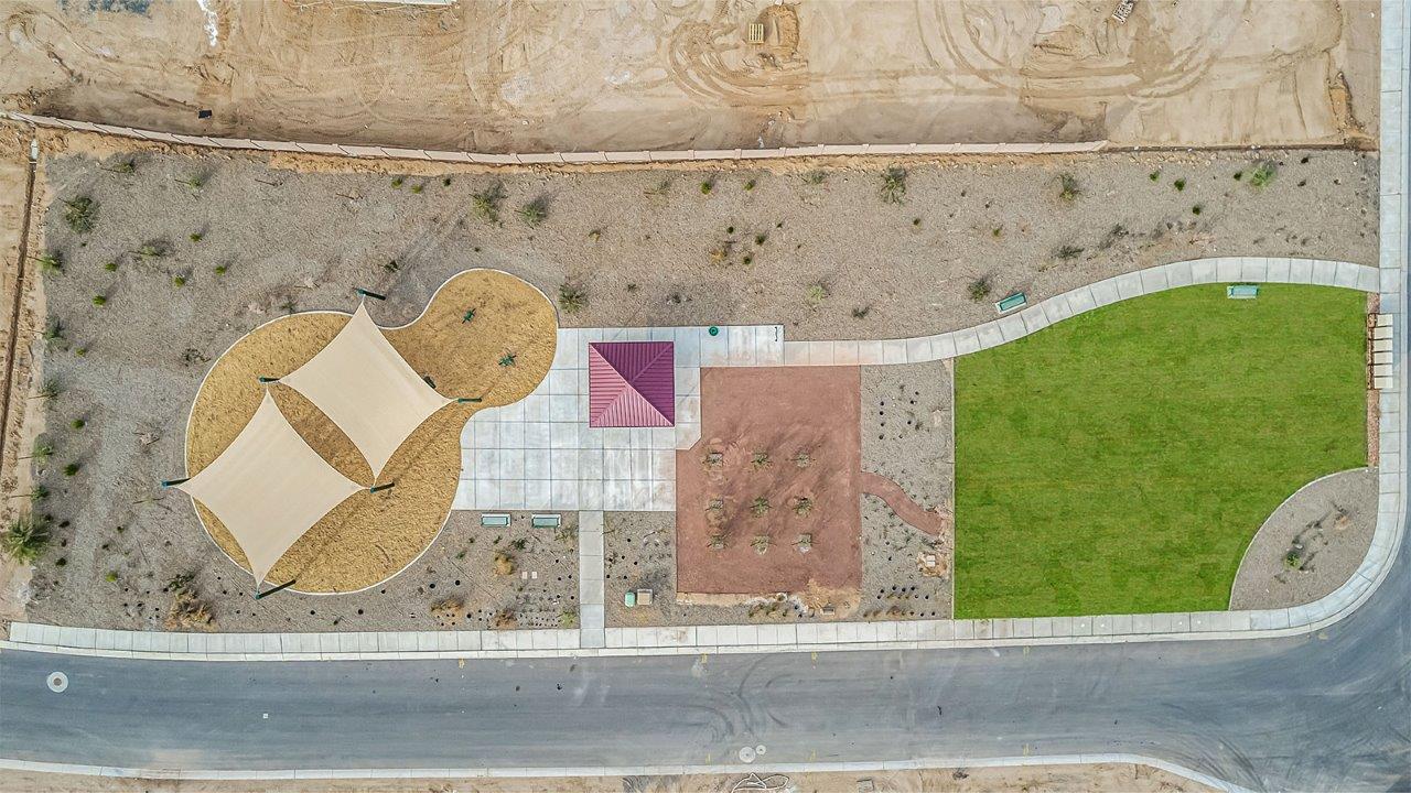 Introducing The Citrine, the crown jewel and largest floorplan within the Tortolita Trails community, located in the scenic Dove Mountain area of Marana, Arizona. Spanning 2,577 square feet, this impressive single-story new home offers a blend of space, style, and contemporary convenience, perfect for families seeking room to grow and entertain.  As you step through the welcoming entryway, you’re immediately drawn into the expansive great room, which flows comfortably into the dining area and kitchen. This open layout creates a warm and inviting atmosphere, ideal for both casual family dinners and larger gatherings. The kitchen is a chef's delight, complete with a spacious island, high-end quartz countertops, and ample storage within the 42” shaker-style cabinets. Adjacent to the kitchen, a cozy nook provides the perfect spot for morning coffee while enjoying views of the backyard.  The Citrine boasts five well-appointed bedrooms, providing flexibility for various lifestyle needs. The primary bedroom is situated at the rear of the home for added privacy, featuring a generous walk-in closet and a luxurious en-suite bathroom with dual sinks and a tiled shower. The additional four bedrooms are thoughtfully distributed throughout the home, offering comfort and convenience for guests or family members.  Outdoor living is a key feature of The Citrine, with a covered patio that extends the living space into the backyard, perfect for al fresco dining or simply relaxing in the shade. The two-car garage not only provides ample space for vehicles but also includes additional storage options to keep your home organized.  Energy efficiency and modern technology are at the forefront of The Citrine’s design. The home is equipped with tankless water heaters, energy-efficient LED lighting, and advanced spray foam insulation, all meeting the stringent DOE Zero Energy Ready Home standards. A Home is Connected® Smart Home package further enhances everyday living, with features like a smart thermostat, video doorbell, keyless entry, a Wi-Fi-enabled garage door opener and more.   As the largest floorplan within Tortolita Trails, The Citrine stands out not only for its size but also for its intentional layout and premium finishes. This home offers an unparalleled living experience in a community that embraces both elegance and a deep connection to nature. With easy access to outdoor activities, top-rated schools, and upscale amenities, The Citrine provides the perfect blend of comfort, style, and convenience in one of Arizona's most desirable neighborhoods.