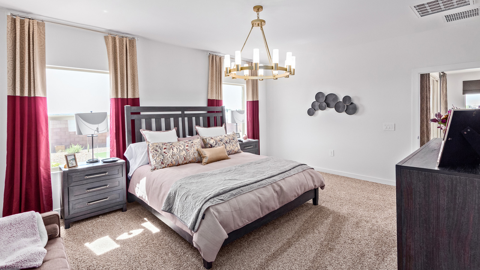 Introducing The Citrine, the crown jewel and largest floorplan within the Tortolita Trails community, located in the scenic Dove Mountain area of Marana, Arizona. Spanning 2,577 square feet, this impressive single-story new home offers a blend of space, style, and contemporary convenience, perfect for families seeking room to grow and entertain.  As you step through the welcoming entryway, you’re immediately drawn into the expansive great room, which flows comfortably into the dining area and kitchen. This open layout creates a warm and inviting atmosphere, ideal for both casual family dinners and larger gatherings. The kitchen is a chef's delight, complete with a spacious island, high-end quartz countertops, and ample storage within the 42” shaker-style cabinets. Adjacent to the kitchen, a cozy nook provides the perfect spot for morning coffee while enjoying views of the backyard.  The Citrine boasts five well-appointed bedrooms, providing flexibility for various lifestyle needs. The primary bedroom is situated at the rear of the home for added privacy, featuring a generous walk-in closet and a luxurious en-suite bathroom with dual sinks and a tiled shower. The additional four bedrooms are thoughtfully distributed throughout the home, offering comfort and convenience for guests or family members.  Outdoor living is a key feature of The Citrine, with a covered patio that extends the living space into the backyard, perfect for al fresco dining or simply relaxing in the shade. The two-car garage not only provides ample space for vehicles but also includes additional storage options to keep your home organized.  Energy efficiency and modern technology are at the forefront of The Citrine’s design. The home is equipped with tankless water heaters, energy-efficient LED lighting, and advanced spray foam insulation, all meeting the stringent DOE Zero Energy Ready Home standards. A Home is Connected® Smart Home package further enhances everyday living, with features like a smart thermostat, video doorbell, keyless entry, a Wi-Fi-enabled garage door opener and more.   As the largest floorplan within Tortolita Trails, The Citrine stands out not only for its size but also for its intentional layout and premium finishes. This home offers an unparalleled living experience in a community that embraces both elegance and a deep connection to nature. With easy access to outdoor activities, top-rated schools, and upscale amenities, The Citrine provides the perfect blend of comfort, style, and convenience in one of Arizona's most desirable neighborhoods.