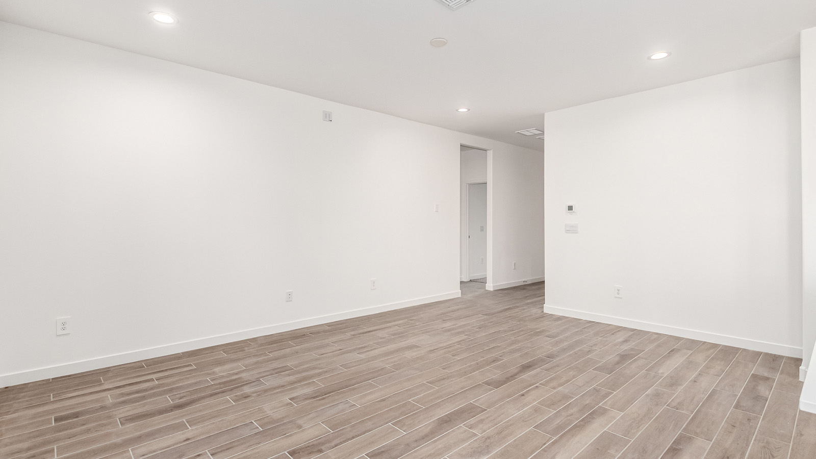 Welcome to Tortolita Trails, where luxury meets nature in the serene surroundings of Dove Mountain, Marana, Arizona. The Baxter is a well-conceived new home within this exclusive community, offering 1,423 square feet of pure comfort and convenience. This three-bedroom, two-bathroom home is designed to fit the needs of modern living while blending seamlessly with the natural beauty of its surroundings.  Upon entering The Baxter, you'll be greeted by a spacious great room that flows effortlessly into the dining area and kitchen, making it an ideal space for gatherings. The kitchen, with its large pantry, modern appliances, and ample counter space, is the heart of this home, ready to handle everything from weeknight dinners to holiday feasts. The adjacent dining area opens to a covered patio, perfect for enjoying the beautiful Arizona evenings.  The primary bedroom is a true haven, featuring a walk-in closet and an en-suite bathroom that offers both privacy and functionality. The additional two bedrooms are well-sized, providing flexibility for family, guests, or a home office. With a three-car garage, you'll have plenty of space for vehicles, storage, or even a workshop.  The Baxter also includes a range of standard features that enhance everyday living. Enjoy energy-efficient construction that not only reduces your carbon footprint but also lowers utility bills. The home is equipped with advanced insulation, energy-efficient windows, and smart home technology, ensuring comfort and convenience year-round.  Living in Tortolita Trails means you’re part of a community that values both luxury and sustainability. With access to extensive walking trails, parks, and outdoor activities, as well as proximity to top-rated schools and essential amenities, The Baxter offers a lifestyle that’s hard to match.  Come home to The Baxter at Tortolita Trails, where every detail is designed to enhance your everyday life while allowing you to enjoy the natural beauty of Arizona to the fullest.