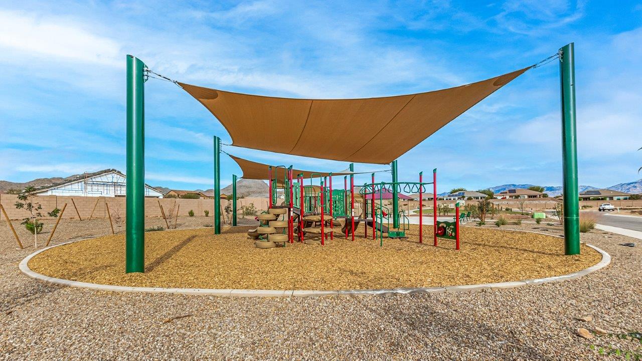 Welcome to Tortolita Trails, where luxury meets nature in the serene surroundings of Dove Mountain, Marana, Arizona. The Baxter is a well-conceived new home within this exclusive community, offering 1,423 square feet of pure comfort and convenience. This three-bedroom, two-bathroom home is designed to fit the needs of modern living while blending seamlessly with the natural beauty of its surroundings.  Upon entering The Baxter, you'll be greeted by a spacious great room that flows effortlessly into the dining area and kitchen, making it an ideal space for gatherings. The kitchen, with its large pantry, modern appliances, and ample counter space, is the heart of this home, ready to handle everything from weeknight dinners to holiday feasts. The adjacent dining area opens to a covered patio, perfect for enjoying the beautiful Arizona evenings.  The primary bedroom is a true haven, featuring a walk-in closet and an en-suite bathroom that offers both privacy and functionality. The additional two bedrooms are well-sized, providing flexibility for family, guests, or a home office. With a three-car garage, you'll have plenty of space for vehicles, storage, or even a workshop.  The Baxter also includes a range of standard features that enhance everyday living. Enjoy energy-efficient construction that not only reduces your carbon footprint but also lowers utility bills. The home is equipped with advanced insulation, energy-efficient windows, and smart home technology, ensuring comfort and convenience year-round.  Living in Tortolita Trails means you’re part of a community that values both luxury and sustainability. With access to extensive walking trails, parks, and outdoor activities, as well as proximity to top-rated schools and essential amenities, The Baxter offers a lifestyle that’s hard to match.  Come home to The Baxter at Tortolita Trails, where every detail is designed to enhance your everyday life while allowing you to enjoy the natural beauty of Arizona to the fullest.