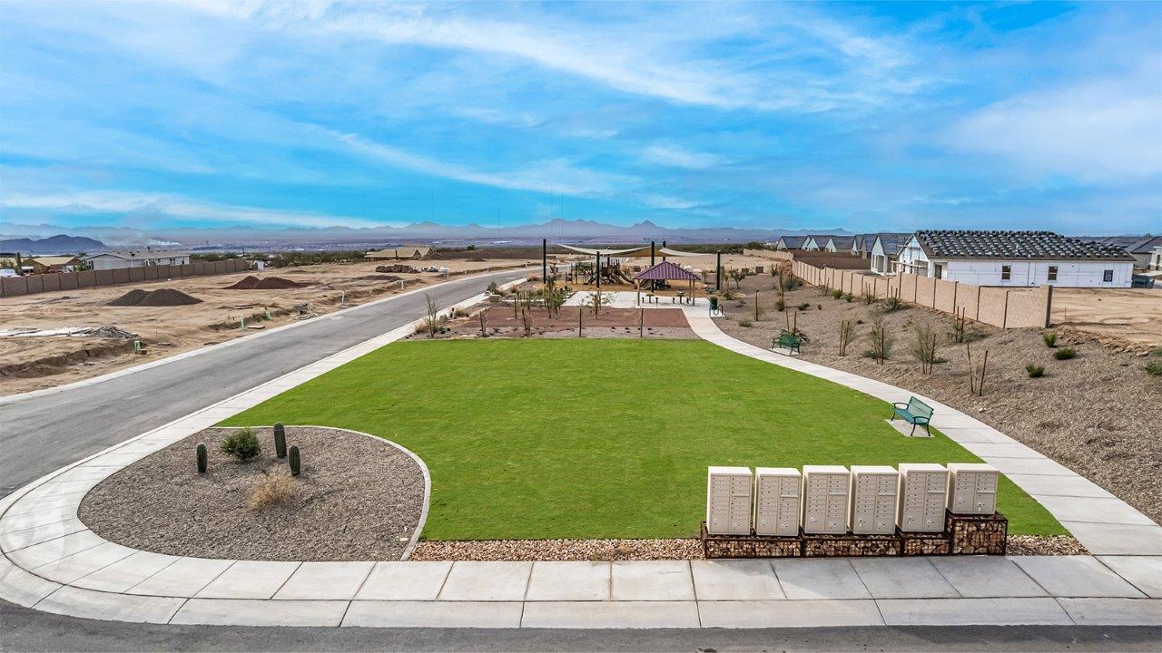 Discover the essence of Arizona living at Tortolita Trails, where The Cali plan offers an inviting blend of comfort and style. This 1,823 square foot single-story new home, located in the prestigious Dove Mountain area of Marana, Arizona, is designed to accommodate the needs of modern families. With four bedrooms and two bathrooms, The Cali provides ample space for relaxation, entertaining, and everything in between.  Step inside and be greeted by an open-concept layout that seamlessly connects the kitchen, dining room, and great room, creating a spacious environment perfect for gatherings. The kitchen, featuring a large pantry, modern appliances, and ample counter space, is a home chef's dream. The adjoining great room, with easy access to a covered patio, invites you to extend your living space outdoors, perfect for enjoying Arizona’s year-round sunshine.  The private primary suite is a true highlight, offering a spacious bedroom, a walk-in closet, and a bathroom complete with dual sinks and a large shower. Three additional bedrooms provide versatility for family members, guests, or a home office setup. A second bathroom, conveniently located near these bedrooms, ensures comfort for all.  In The Cali, you'll find a range of high-quality standard features that elevate your living experience. The home includes a modern kitchen with a large pantry, quartz countertops, stylish cabinetry, and energy-efficient appliances. The great room, designed for both comfort and functionality, connects seamlessly to the dining area and kitchen, creating an ideal space for entertaining. The covered patio offers an inviting outdoor retreat, perfect for enjoying Arizona's beautiful weather. Additionally, the home includes a two-car garage, providing ample storage and parking space.  Practicality meets style in The Cali, with thoughtful design elements like a utility room, abundant storage, and a two-car garage. Energy-efficient features throughout the home ensure that you can enjoy your space comfortably while keeping utility costs low.  Outside, Tortolita Trails offers a community atmosphere enriched with scenic views, recreational trails, and proximity to top-rated schools, shopping, and dining options. Whether you’re relaxing on the covered patio or exploring the surrounding natural beauty, The Cali at Tortolita Trails provides the perfect balance of modern living and outdoor adventure.