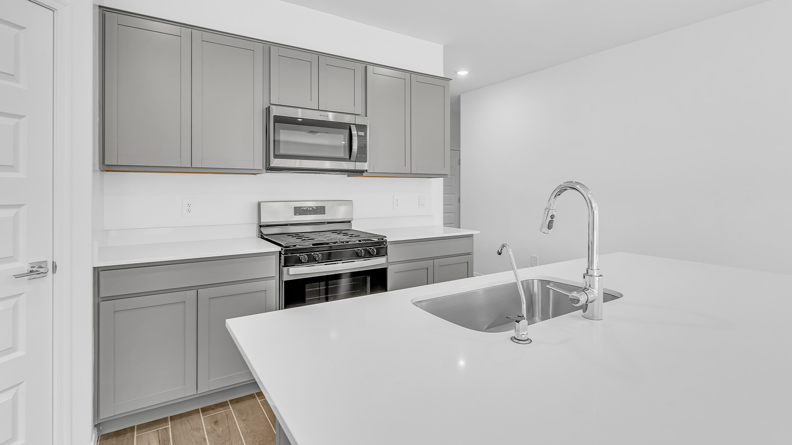 Discover the essence of Arizona living at Tortolita Trails, where The Cali plan offers an inviting blend of comfort and style. This 1,823 square foot single-story new home, located in the prestigious Dove Mountain area of Marana, Arizona, is designed to accommodate the needs of modern families. With four bedrooms and two bathrooms, The Cali provides ample space for relaxation, entertaining, and everything in between.  Step inside and be greeted by an open-concept layout that seamlessly connects the kitchen, dining room, and great room, creating a spacious environment perfect for gatherings. The kitchen, featuring a large pantry, modern appliances, and ample counter space, is a home chef's dream. The adjoining great room, with easy access to a covered patio, invites you to extend your living space outdoors, perfect for enjoying Arizona’s year-round sunshine.  The private primary suite is a true highlight, offering a spacious bedroom, a walk-in closet, and a bathroom complete with dual sinks and a large shower. Three additional bedrooms provide versatility for family members, guests, or a home office setup. A second bathroom, conveniently located near these bedrooms, ensures comfort for all.  In The Cali, you'll find a range of high-quality standard features that elevate your living experience. The home includes a modern kitchen with a large pantry, quartz countertops, stylish cabinetry, and energy-efficient appliances. The great room, designed for both comfort and functionality, connects seamlessly to the dining area and kitchen, creating an ideal space for entertaining. The covered patio offers an inviting outdoor retreat, perfect for enjoying Arizona's beautiful weather. Additionally, the home includes a two-car garage, providing ample storage and parking space.  Practicality meets style in The Cali, with thoughtful design elements like a utility room, abundant storage, and a two-car garage. Energy-efficient features throughout the home ensure that you can enjoy your space comfortably while keeping utility costs low.  Outside, Tortolita Trails offers a community atmosphere enriched with scenic views, recreational trails, and proximity to top-rated schools, shopping, and dining options. Whether you’re relaxing on the covered patio or exploring the surrounding natural beauty, The Cali at Tortolita Trails provides the perfect balance of modern living and outdoor adventure.