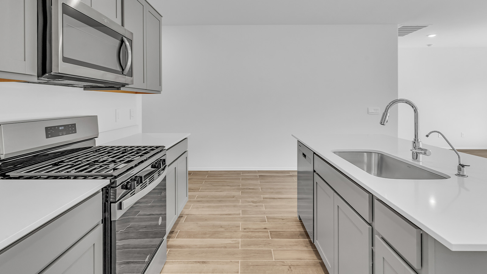 Discover the essence of Arizona living at Tortolita Trails, where The Cali plan offers an inviting blend of comfort and style. This 1,823 square foot single-story new home, located in the prestigious Dove Mountain area of Marana, Arizona, is designed to accommodate the needs of modern families. With four bedrooms and two bathrooms, The Cali provides ample space for relaxation, entertaining, and everything in between.  Step inside and be greeted by an open-concept layout that seamlessly connects the kitchen, dining room, and great room, creating a spacious environment perfect for gatherings. The kitchen, featuring a large pantry, modern appliances, and ample counter space, is a home chef's dream. The adjoining great room, with easy access to a covered patio, invites you to extend your living space outdoors, perfect for enjoying Arizona’s year-round sunshine.  The private primary suite is a true highlight, offering a spacious bedroom, a walk-in closet, and a bathroom complete with dual sinks and a large shower. Three additional bedrooms provide versatility for family members, guests, or a home office setup. A second bathroom, conveniently located near these bedrooms, ensures comfort for all.  In The Cali, you'll find a range of high-quality standard features that elevate your living experience. The home includes a modern kitchen with a large pantry, quartz countertops, stylish cabinetry, and energy-efficient appliances. The great room, designed for both comfort and functionality, connects seamlessly to the dining area and kitchen, creating an ideal space for entertaining. The covered patio offers an inviting outdoor retreat, perfect for enjoying Arizona's beautiful weather. Additionally, the home includes a two-car garage, providing ample storage and parking space.  Practicality meets style in The Cali, with thoughtful design elements like a utility room, abundant storage, and a two-car garage. Energy-efficient features throughout the home ensure that you can enjoy your space comfortably while keeping utility costs low.  Outside, Tortolita Trails offers a community atmosphere enriched with scenic views, recreational trails, and proximity to top-rated schools, shopping, and dining options. Whether you’re relaxing on the covered patio or exploring the surrounding natural beauty, The Cali at Tortolita Trails provides the perfect balance of modern living and outdoor adventure.