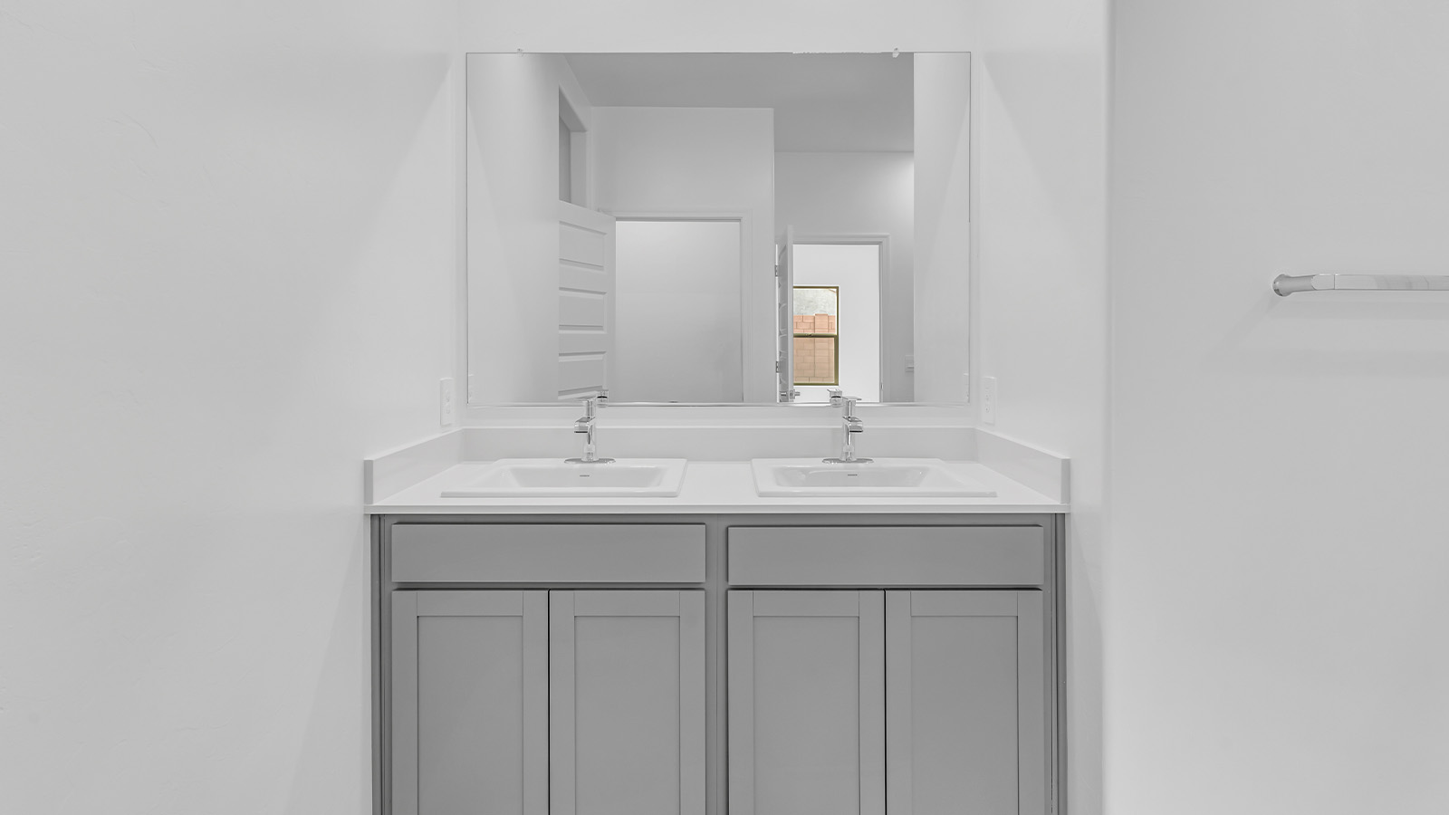 Discover the essence of Arizona living at Tortolita Trails, where The Cali plan offers an inviting blend of comfort and style. This 1,823 square foot single-story new home, located in the prestigious Dove Mountain area of Marana, Arizona, is designed to accommodate the needs of modern families. With four bedrooms and two bathrooms, The Cali provides ample space for relaxation, entertaining, and everything in between.  Step inside and be greeted by an open-concept layout that seamlessly connects the kitchen, dining room, and great room, creating a spacious environment perfect for gatherings. The kitchen, featuring a large pantry, modern appliances, and ample counter space, is a home chef's dream. The adjoining great room, with easy access to a covered patio, invites you to extend your living space outdoors, perfect for enjoying Arizona’s year-round sunshine.  The private primary suite is a true highlight, offering a spacious bedroom, a walk-in closet, and a bathroom complete with dual sinks and a large shower. Three additional bedrooms provide versatility for family members, guests, or a home office setup. A second bathroom, conveniently located near these bedrooms, ensures comfort for all.  In The Cali, you'll find a range of high-quality standard features that elevate your living experience. The home includes a modern kitchen with a large pantry, quartz countertops, stylish cabinetry, and energy-efficient appliances. The great room, designed for both comfort and functionality, connects seamlessly to the dining area and kitchen, creating an ideal space for entertaining. The covered patio offers an inviting outdoor retreat, perfect for enjoying Arizona's beautiful weather. Additionally, the home includes a two-car garage, providing ample storage and parking space.  Practicality meets style in The Cali, with thoughtful design elements like a utility room, abundant storage, and a two-car garage. Energy-efficient features throughout the home ensure that you can enjoy your space comfortably while keeping utility costs low.  Outside, Tortolita Trails offers a community atmosphere enriched with scenic views, recreational trails, and proximity to top-rated schools, shopping, and dining options. Whether you’re relaxing on the covered patio or exploring the surrounding natural beauty, The Cali at Tortolita Trails provides the perfect balance of modern living and outdoor adventure.