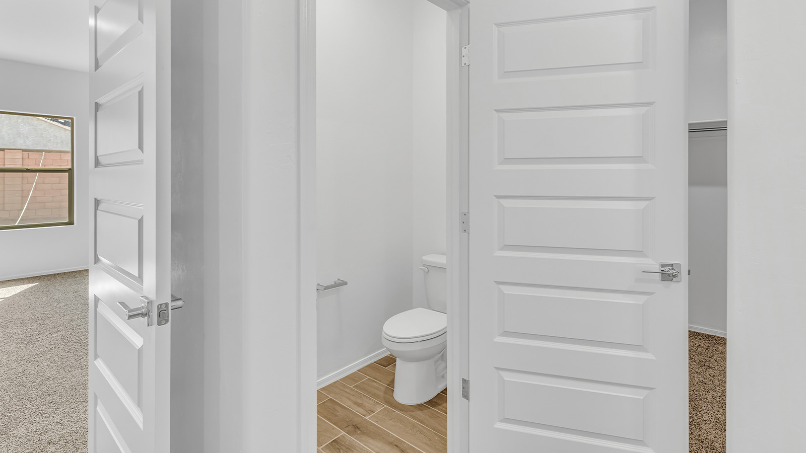 Discover the essence of Arizona living at Tortolita Trails, where The Cali plan offers an inviting blend of comfort and style. This 1,823 square foot single-story new home, located in the prestigious Dove Mountain area of Marana, Arizona, is designed to accommodate the needs of modern families. With four bedrooms and two bathrooms, The Cali provides ample space for relaxation, entertaining, and everything in between.  Step inside and be greeted by an open-concept layout that seamlessly connects the kitchen, dining room, and great room, creating a spacious environment perfect for gatherings. The kitchen, featuring a large pantry, modern appliances, and ample counter space, is a home chef's dream. The adjoining great room, with easy access to a covered patio, invites you to extend your living space outdoors, perfect for enjoying Arizona’s year-round sunshine.  The private primary suite is a true highlight, offering a spacious bedroom, a walk-in closet, and a bathroom complete with dual sinks and a large shower. Three additional bedrooms provide versatility for family members, guests, or a home office setup. A second bathroom, conveniently located near these bedrooms, ensures comfort for all.  In The Cali, you'll find a range of high-quality standard features that elevate your living experience. The home includes a modern kitchen with a large pantry, quartz countertops, stylish cabinetry, and energy-efficient appliances. The great room, designed for both comfort and functionality, connects seamlessly to the dining area and kitchen, creating an ideal space for entertaining. The covered patio offers an inviting outdoor retreat, perfect for enjoying Arizona's beautiful weather. Additionally, the home includes a two-car garage, providing ample storage and parking space.  Practicality meets style in The Cali, with thoughtful design elements like a utility room, abundant storage, and a two-car garage. Energy-efficient features throughout the home ensure that you can enjoy your space comfortably while keeping utility costs low.  Outside, Tortolita Trails offers a community atmosphere enriched with scenic views, recreational trails, and proximity to top-rated schools, shopping, and dining options. Whether you’re relaxing on the covered patio or exploring the surrounding natural beauty, The Cali at Tortolita Trails provides the perfect balance of modern living and outdoor adventure.