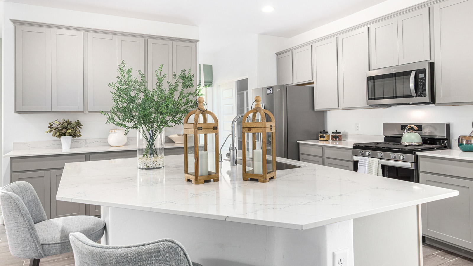 Introducing The Kingston, a spacious four-bedroom home settled within the peaceful community of Tortolita Trails in Marana, Arizona. With 2,051 square feet of living space, this single-story new home design offers both comfort and practicality for modern family life.