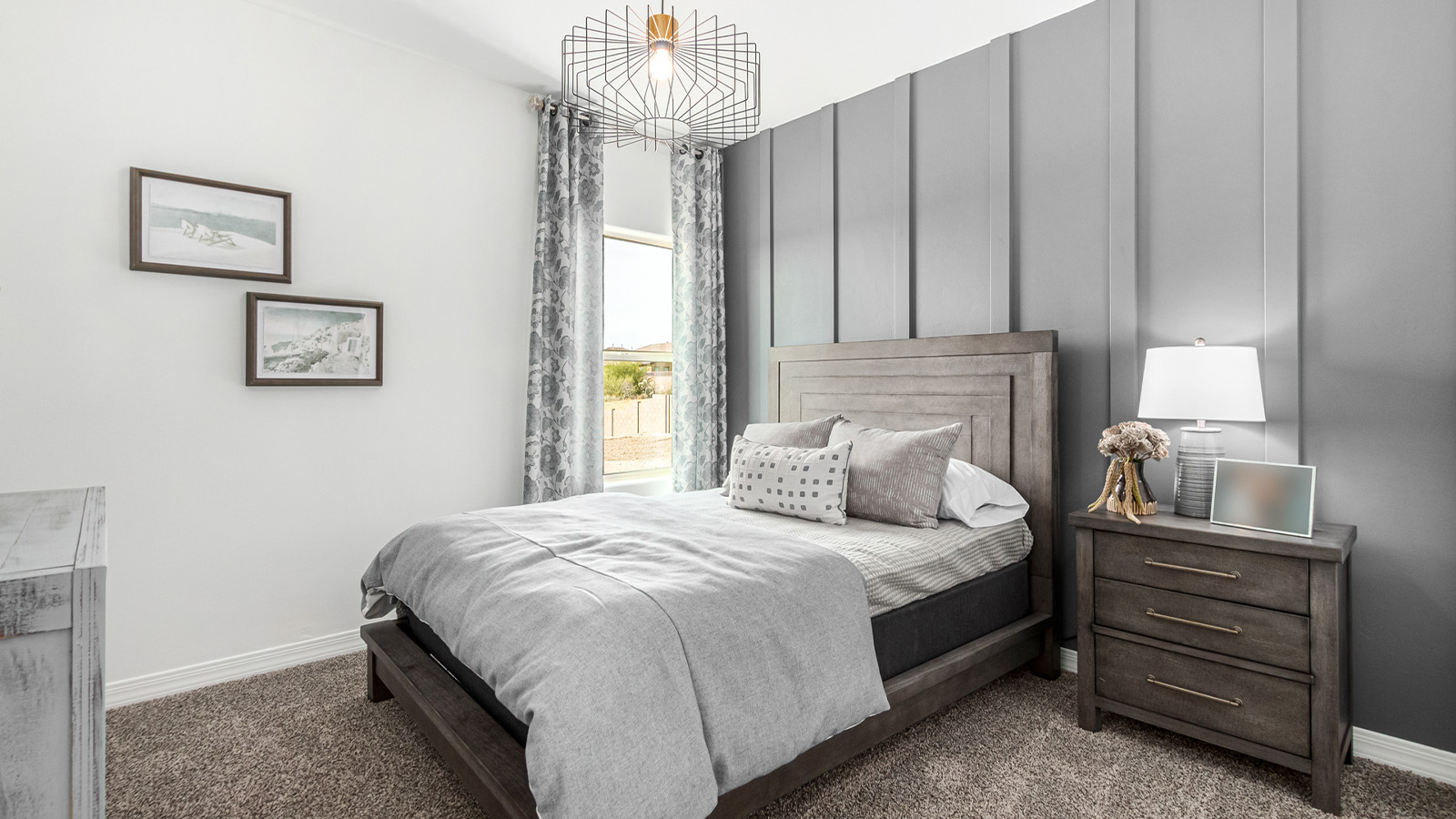 Introducing The Kingston, a spacious four-bedroom home settled within the peaceful community of Tortolita Trails in Marana, Arizona. With 2,051 square feet of living space, this single-story new home design offers both comfort and practicality for modern family life.