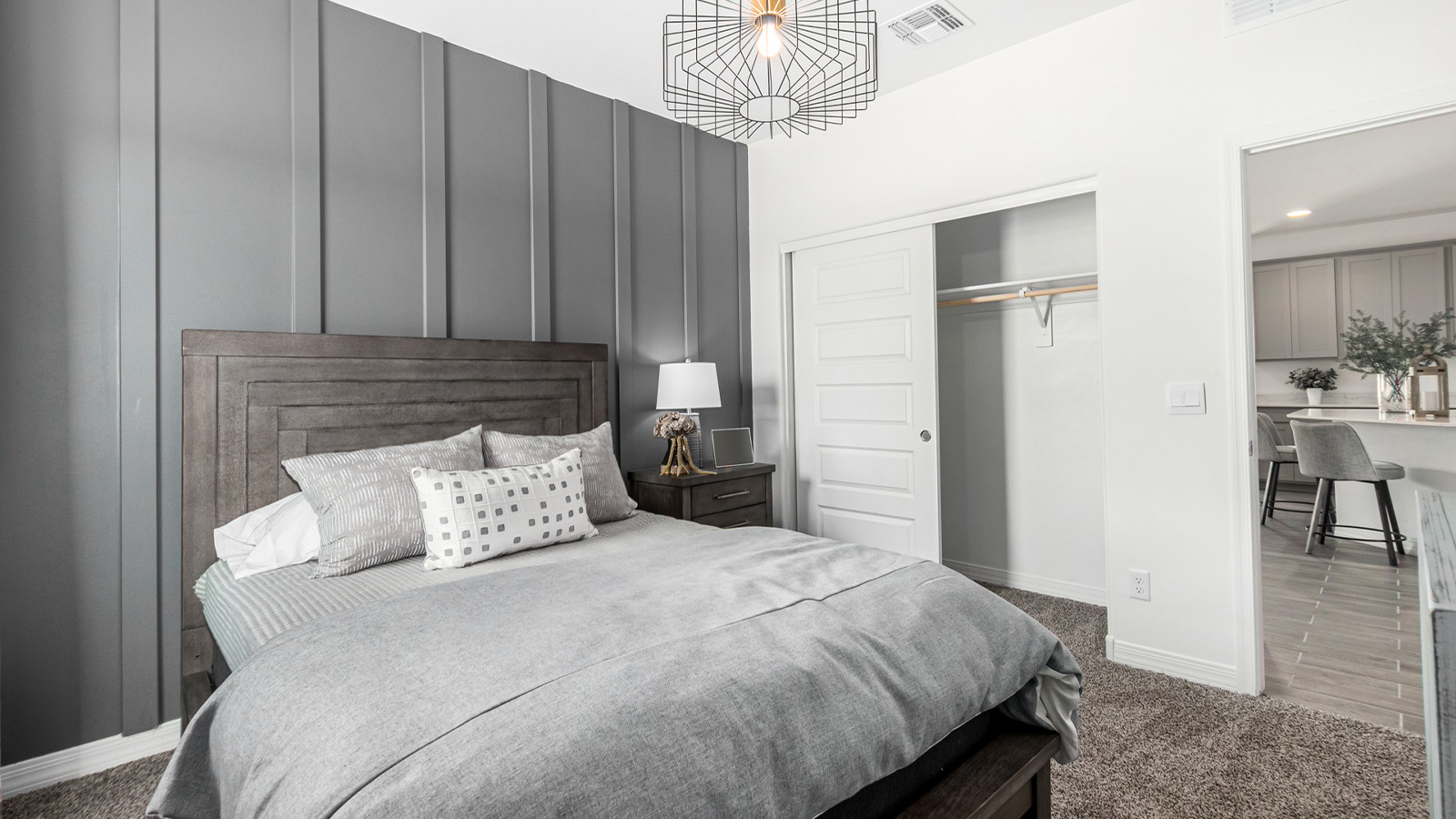 Introducing The Kingston, a spacious four-bedroom home settled within the peaceful community of Tortolita Trails in Marana, Arizona. With 2,051 square feet of living space, this single-story new home design offers both comfort and practicality for modern family life.