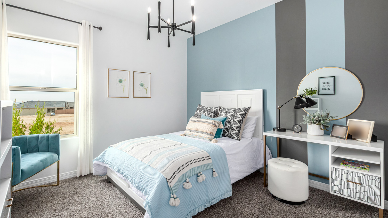 Introducing The Kingston, a spacious four-bedroom home settled within the peaceful community of Tortolita Trails in Marana, Arizona. With 2,051 square feet of living space, this single-story new home design offers both comfort and practicality for modern family life.