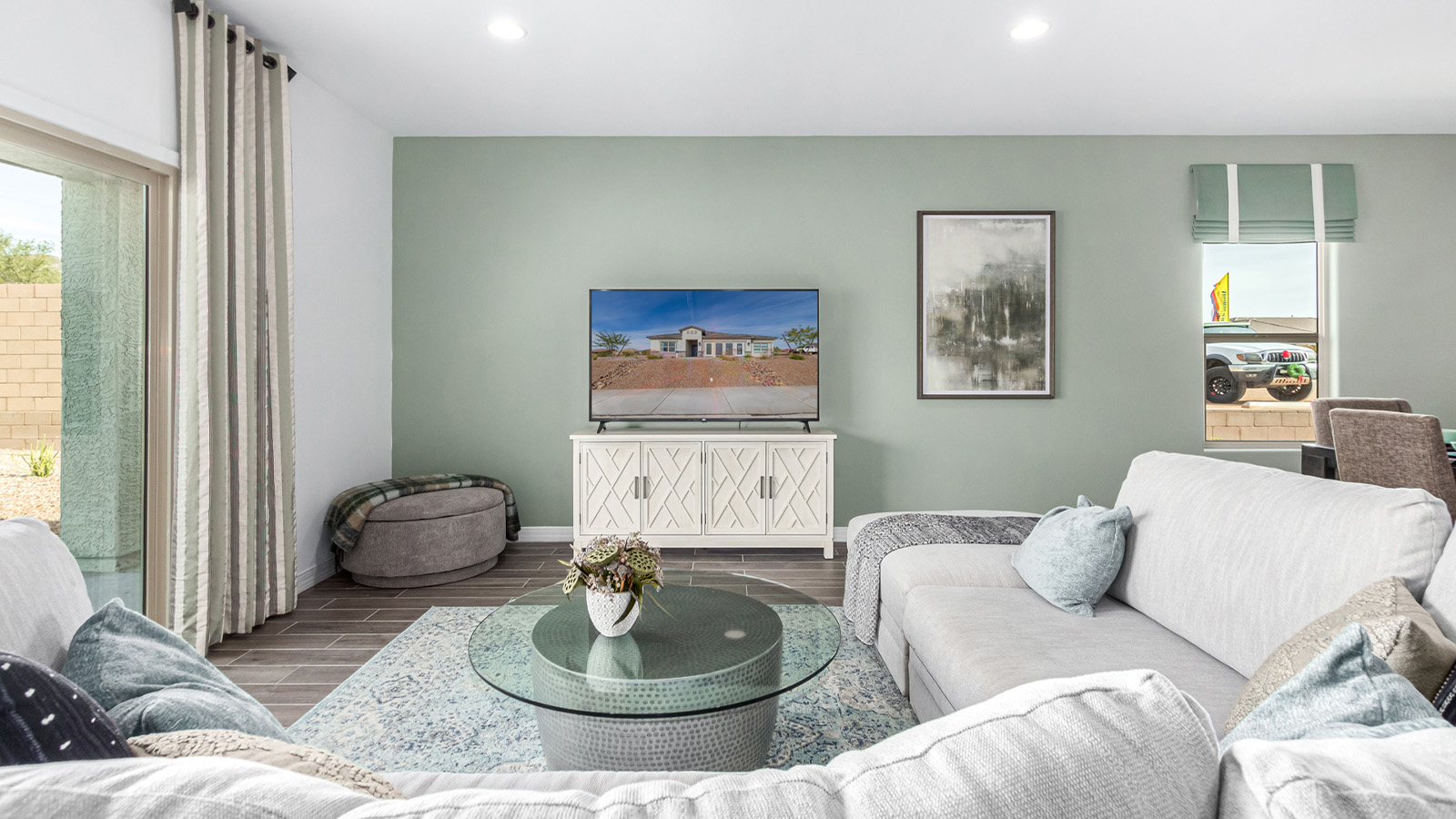 Introducing The Kingston, a spacious four-bedroom home settled within the peaceful community of Tortolita Trails in Marana, Arizona. With 2,051 square feet of living space, this single-story new home design offers both comfort and practicality for modern family life.  Upon entering, you're greeted by a welcoming foyer that flows into an open-concept layout, where each area of the home is thoughtfully arranged for easy living. The kitchen, complete with a large quartz countertop island and top-of-the-line appliances, is perfectly suited for both everyday meals and special gatherings. Adjacent to the kitchen, the great room invites relaxation and socializing, with direct access to a covered patio where you can unwind and appreciate the desert views.  The primary suite is a private retreat, featuring a generous walk-in closet and an en-suite bathroom with dual sinks and a walk-in shower. The three additional bedrooms are well-sized, providing ample space for family, guests, or a home office. A second bathroom and a convenient utility room add to the home's functionality.  Homes at Tortolita Trails are equipped with high-quality features, including quartz countertops, 42” shaker-style cabinets, and durable wood-look tile flooring. The community’s focus on energy efficiency is reflected in the inclusion of tankless water heaters, LED lighting, and advanced spray foam insulation, offering both comfort and cost savings.  The Kingston also includes a suite of smart home features, such as a video doorbell, keyless entry, a Wi-Fi-enabled garage door opener and more, all designed to make your daily life easier and more connected.  Living in Tortolita Trails means enjoying the perfect balance of privacy and community, with access to parks, playgrounds, and miles of scenic trails. The Kingston at Tortolita Trails offers a blend of modern conveniences and natural surroundings, making it the ideal place to call home.