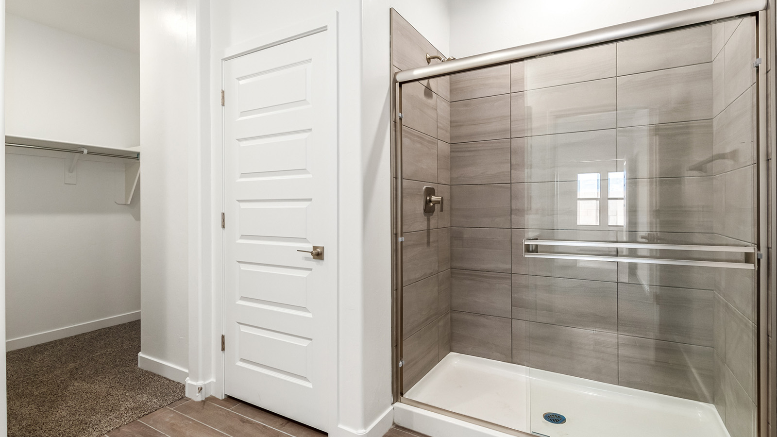 Snuggled within the serene surroundings of Sycamore Vista, The Baxter offers a blend of comfort and convenience, making it a perfect fit for modern living. Spanning 1,423 square feet, this thoughtfully crafted single-story home features three bedrooms, two bathrooms, and a flexible 2-3 car garage, all within the picturesque foothills of the Santa Rita Mountains.  As you step onto the welcoming front porch and enter through the foyer, you’re greeted by a spacious and open floor plan that flows effortlessly into the heart of the home. The great room is designed for both relaxation and socializing, seamlessly connecting to the dining area and kitchen. The kitchen is a culinary enthusiast's dream, featuring sleek granite countertops, a central island, and Shaker-style cabinetry, all designed to offer ample storage and a stylish backdrop for your cooking adventures. The adjacent pantry ensures that all your essentials are within easy reach, making meal prep both efficient and enjoyable.  The primary bedroom, located at the rear of the home for enhanced privacy, serves as a peaceful retreat. It includes a spacious walk-in closet and an en-suite bathroom equipped with dual vanities and a luxurious shower. The two additional bedrooms are thoughtfully positioned near the front of the home, sharing a full bathroom, making it ideal for families or guests.  Outdoor living is a key feature of The Baxter, with a covered patio that extends from the dining area, offering the perfect space to enjoy Tucson’s stunning sunsets or host a weekend barbecue. The 2-3 car garage provides ample space for vehicles, storage, or even a small workshop, catering to various needs.  Living in Sycamore Vista means you’re part of a community that values both convenience and quality of life. Each home in this community comes with beautifully landscaped front yards, equipped with auto drip irrigation systems and soft water loops, enhancing the beauty and functionality of your outdoor space. Additionally, Sycamore Vista homes are energy-efficient, featuring DOE Zero Energy Ready standards, including spray foam insulation, tankless water heaters, and LED lighting throughout, ensuring lower energy costs and a reduced environmental footprint.  The community’s higher elevation not only offers cooler summer temperatures but also less light pollution, making it a perfect spot for stargazing. Sycamore Vista is ideally located near top-rated schools in the Vail School District, including Sycamore Elementary and Corona Foothills Middle School, making it an ideal choice for families.  Beyond the tranquility of home, outdoor enthusiasts will appreciate the proximity to local state and national parks, including Coronado National Forest and Colossal Cave Mountain Park, offering endless opportunities for hiking, biking, and exploring Arizona’s natural beauty. The community’s location also provides easy access to shopping, dining, and major employers like the Target Distribution Center and the Amazon Fulfillment Center, ensuring that everything you need is within reach.  Experience the best of Arizona living at Sycamore Vista, where The Baxter offers the perfect blend of modern amenities, quality craftsmanship, and the natural beauty of the Santa Rita Mountains, creating a place you’ll be proud to call home.