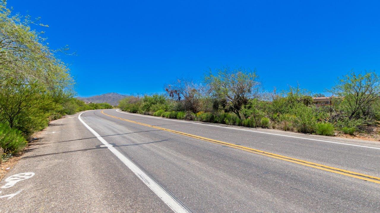 Snuggled within the serene surroundings of Sycamore Vista, The Baxter offers a blend of comfort and convenience, making it a perfect fit for modern living. Spanning 1,423 square feet, this thoughtfully crafted single-story home features three bedrooms, two bathrooms, and a flexible 2-3 car garage, all within the picturesque foothills of the Santa Rita Mountains.  As you step onto the welcoming front porch and enter through the foyer, you’re greeted by a spacious and open floor plan that flows effortlessly into the heart of the home. The great room is designed for both relaxation and socializing, seamlessly connecting to the dining area and kitchen. The kitchen is a culinary enthusiast's dream, featuring sleek granite countertops, a central island, and Shaker-style cabinetry, all designed to offer ample storage and a stylish backdrop for your cooking adventures. The adjacent pantry ensures that all your essentials are within easy reach, making meal prep both efficient and enjoyable.  The primary bedroom, located at the rear of the home for enhanced privacy, serves as a peaceful retreat. It includes a spacious walk-in closet and an en-suite bathroom equipped with dual vanities and a luxurious shower. The two additional bedrooms are thoughtfully positioned near the front of the home, sharing a full bathroom, making it ideal for families or guests.  Outdoor living is a key feature of The Baxter, with a covered patio that extends from the dining area, offering the perfect space to enjoy Tucson’s stunning sunsets or host a weekend barbecue. The 2-3 car garage provides ample space for vehicles, storage, or even a small workshop, catering to various needs.  Living in Sycamore Vista means you’re part of a community that values both convenience and quality of life. Each home in this community comes with beautifully landscaped front yards, equipped with auto drip irrigation systems and soft water loops, enhancing the beauty and functionality of your outdoor space. Additionally, Sycamore Vista homes are energy-efficient, featuring DOE Zero Energy Ready standards, including spray foam insulation, tankless water heaters, and LED lighting throughout, ensuring lower energy costs and a reduced environmental footprint.  The community’s higher elevation not only offers cooler summer temperatures but also less light pollution, making it a perfect spot for stargazing. Sycamore Vista is ideally located near top-rated schools in the Vail School District, including Sycamore Elementary and Corona Foothills Middle School, making it an ideal choice for families.  Beyond the tranquility of home, outdoor enthusiasts will appreciate the proximity to local state and national parks, including Coronado National Forest and Colossal Cave Mountain Park, offering endless opportunities for hiking, biking, and exploring Arizona’s natural beauty. The community’s location also provides easy access to shopping, dining, and major employers like the Target Distribution Center and the Amazon Fulfillment Center, ensuring that everything you need is within reach.  Experience the best of Arizona living at Sycamore Vista, where The Baxter offers the perfect blend of modern amenities, quality craftsmanship, and the natural beauty of the Santa Rita Mountains, creating a place you’ll be proud to call home.