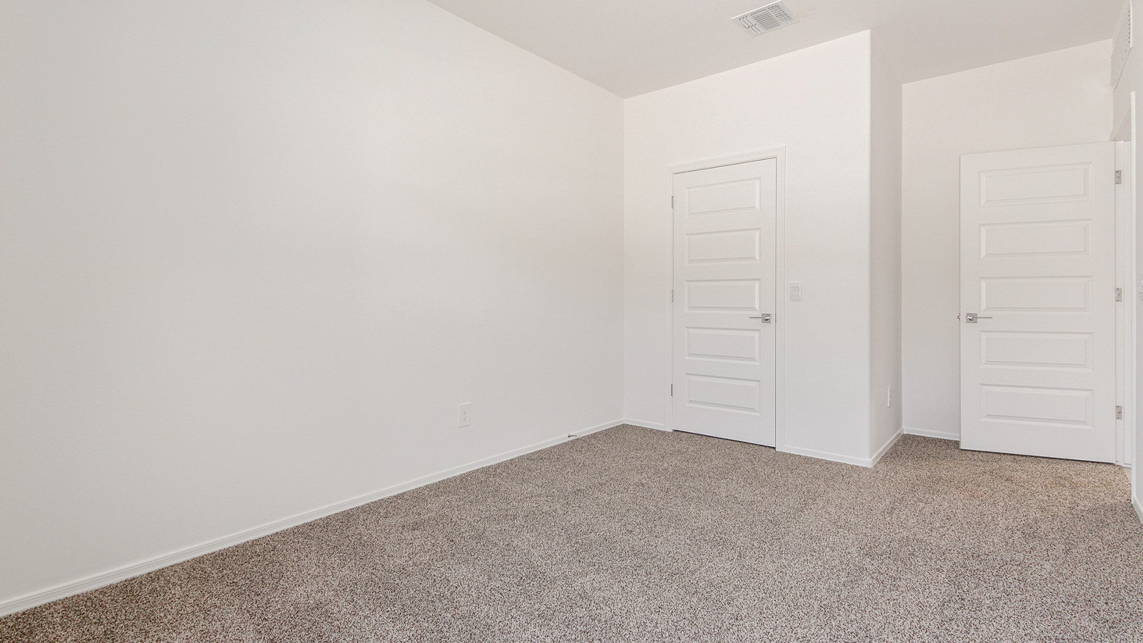 Step into The Elgin, a spacious single-story home located in the scenic Sycamore Vista community in Vail, AZ. This floor plan offers 1,635 square feet of well-planned living space, perfect for those who appreciate both comfort and functionality. With four bedrooms, two bathrooms, and a 3-car garage, The Elgin provides the ideal setting for modern living amidst the beauty of the Santa Rita Mountains.  As you enter through the inviting front porch, you’re welcomed by an open and airy floor plan that flows effortlessly from one room to the next. The heart of the home is the expansive great room, seamlessly connected to the dining area and kitchen, making it ideal for everyday living and entertaining. The kitchen is a chef’s delight, featuring a large island with a breakfast bar, granite countertops, and Shaker-style cabinetry, offering ample storage and workspace. The walk-in pantry and adjacent utility room add convenience and organization to your culinary adventures.  The primary suite is designed with relaxation in mind, offering a spacious bedroom with a walk-in closet and a private en-suite bathroom. This personal haven is positioned at the rear of the home for added privacy. The three additional bedrooms are located towards the front of the home, providing flexibility for guests, family, or a home office setup. A second full bathroom is conveniently situated near these bedrooms.  One of the standout features of The Elgin is the 3-car garage, providing plenty of room for vehicles, storage, or even a workshop. Whether you have multiple cars, recreational vehicles, or just need extra space, this garage has you covered.  Step outside to enjoy your covered patio, which is perfect for outdoor dining, lounging, or simply taking in the stunning Arizona sunsets. The large backyard provides endless possibilities for gardening, play, or creating your own outdoor oasis.  Living at Sycamore Vista means enjoying a community that balances modern amenities with natural beauty. Your home includes luxury finishes such as staggered wood-look ceramic tile flooring throughout most areas, granite countertops, and energy-efficient features like spray foam insulation and tankless water heaters. Additionally, each home in the community comes equipped with a Home is Connected® Smart Home package, offering conveniences like a smart thermostat, video doorbell, keyless entry, a wifi-enabled garage door opener and more.  Sycamore Vista’s prime location in the Vail School District makes it a great choice for families. With schools like Sycamore Elementary and Corona Foothills Middle School nearby, you’ll have peace of mind knowing your children are receiving a quality education. The community’s higher elevation offers cooler summer temperatures and spectacular night skies, making it a perfect spot for stargazing.  Experience the perfect blend of rural charm and modern convenience at Sycamore Vista, where The Elgin offers a space that’s more than just a house—it’s a home designed to grow with you and your family.