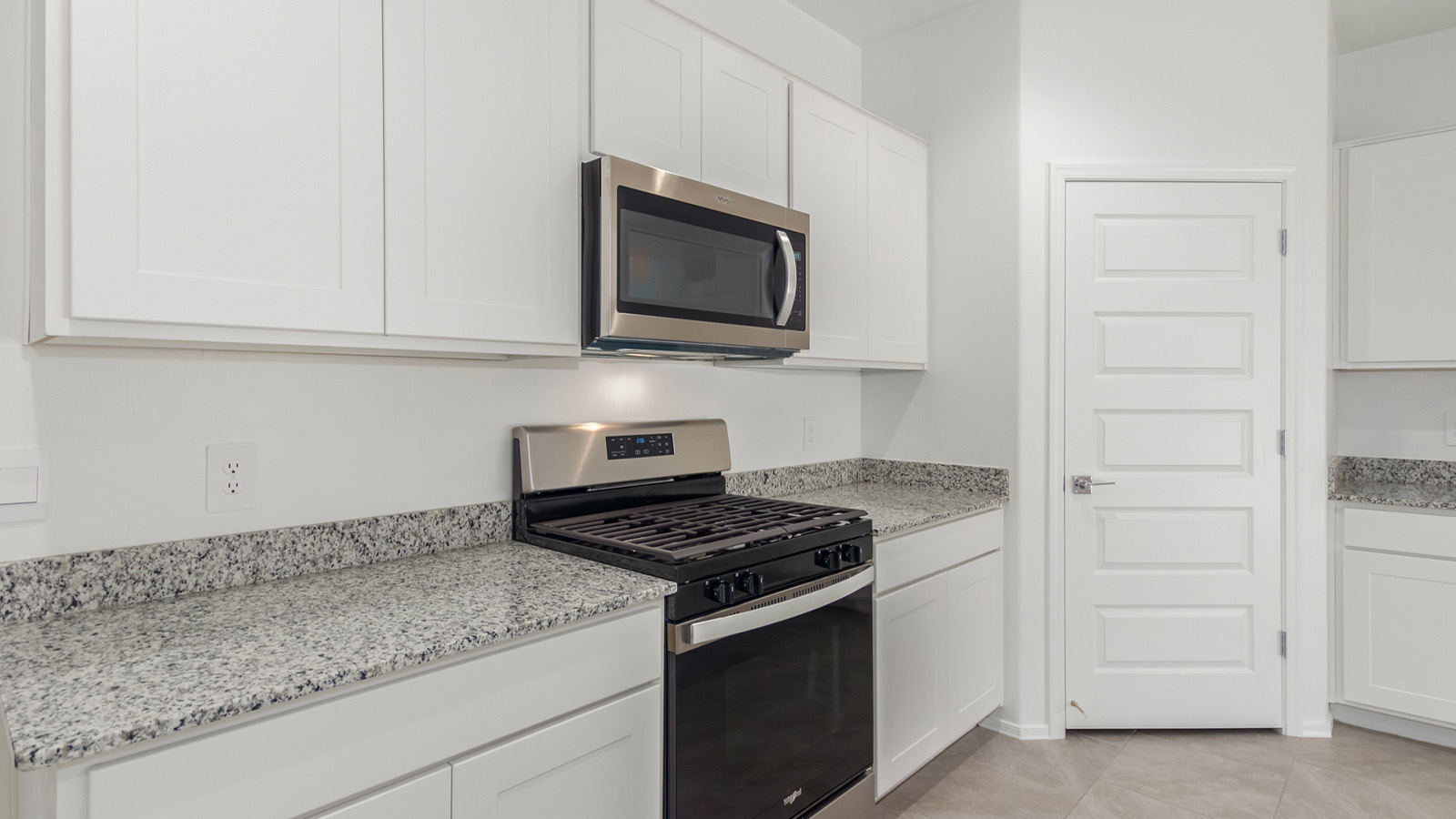 Experience the charm of The Cali, located within the peaceful Sycamore Vista community in the serene foothills of the Santa Rita Mountains, Arizona. This thoughtfully laid-out, single-story home offers 1,823 square feet of versatile living space designed to meet the needs of modern families.  Step into the inviting entryway, where you're welcomed by a spacious great room that serves as the heart of the home. The open-concept design connects the great room to the dining area and kitchen, creating a harmonious flow that's perfect for both entertaining and daily living. The kitchen is a true culinary haven, featuring a large island, granite countertops, and ample storage space with a walk-in pantry.  The Cali's four bedrooms are designed with relaxation in mind. The primary suite, tucked away from the other bedrooms, offers a private oasis complete with a walk-in closet and a well-appointed bathroom featuring dual vanities. The additional three bedrooms share a well-equipped bathroom and are situated to provide comfort and privacy for family members or guests.  Adding to the home's appeal are the premium standard features that come included in every Cali at Sycamore Vista. Enjoy the elegance of staggered wood-look ceramic tile flooring throughout the main living areas, complemented by Shaker-style cabinetry in the kitchen and bathrooms. The kitchen is further enhanced by an open single basin stainless steel sink paired with a water filtration system, making both cooking and cleanup a breeze. The energy-efficient design includes spray foam insulation, a tankless water heater, and LED lighting throughout, all contributing to lower utility costs and a more sustainable lifestyle.  Outdoor living is a breeze with the covered patio, easily accessible from the dining room, providing the perfect spot for morning coffee or evening gatherings. The three-car garage offers plenty of space for vehicles and storage, ensuring that everything you need is within easy reach.  Sycamore Vista's location offers a unique blend of tranquility and convenience, making The Cali an ideal choice for those seeking a peaceful retreat with easy access to modern amenities. Whether you're relaxing indoors or enjoying the outdoor beauty of Arizona, The Cali is a home that combines style, comfort, and functionality in every detail.