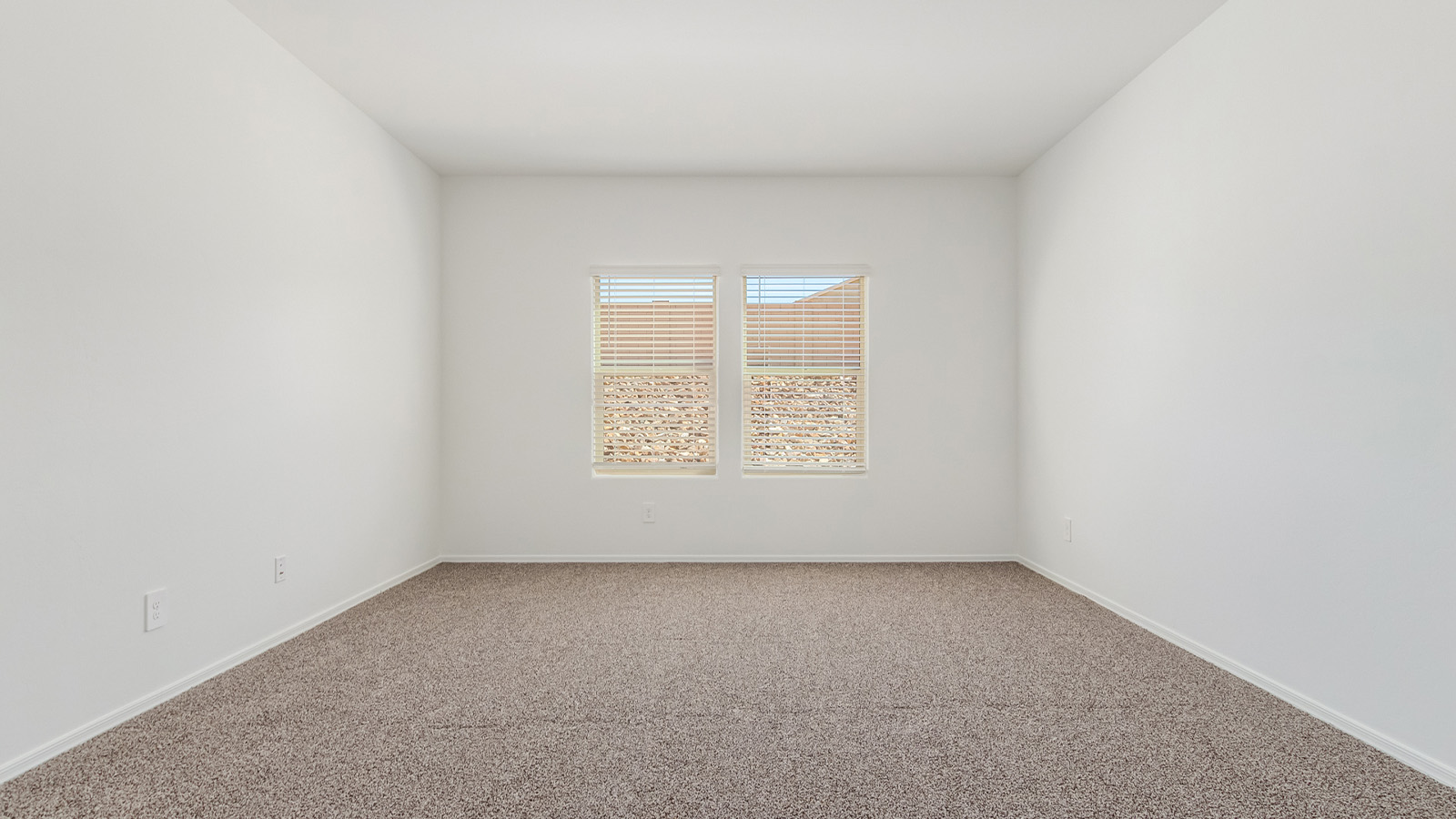 Experience the charm of The Cali, located within the peaceful Sycamore Vista community in the serene foothills of the Santa Rita Mountains, Arizona. This thoughtfully laid-out, single-story home offers 1,823 square feet of versatile living space designed to meet the needs of modern families.  Step into the inviting entryway, where you're welcomed by a spacious great room that serves as the heart of the home. The open-concept design connects the great room to the dining area and kitchen, creating a harmonious flow that's perfect for both entertaining and daily living. The kitchen is a true culinary haven, featuring a large island, granite countertops, and ample storage space with a walk-in pantry.  The Cali's four bedrooms are designed with relaxation in mind. The primary suite, tucked away from the other bedrooms, offers a private oasis complete with a walk-in closet and a well-appointed bathroom featuring dual vanities. The additional three bedrooms share a well-equipped bathroom and are situated to provide comfort and privacy for family members or guests.  Adding to the home's appeal are the premium standard features that come included in every Cali at Sycamore Vista. Enjoy the elegance of staggered wood-look ceramic tile flooring throughout the main living areas, complemented by Shaker-style cabinetry in the kitchen and bathrooms. The kitchen is further enhanced by an open single basin stainless steel sink paired with a water filtration system, making both cooking and cleanup a breeze. The energy-efficient design includes spray foam insulation, a tankless water heater, and LED lighting throughout, all contributing to lower utility costs and a more sustainable lifestyle.  Outdoor living is a breeze with the covered patio, easily accessible from the dining room, providing the perfect spot for morning coffee or evening gatherings. The three-car garage offers plenty of space for vehicles and storage, ensuring that everything you need is within easy reach.  Sycamore Vista's location offers a unique blend of tranquility and convenience, making The Cali an ideal choice for those seeking a peaceful retreat with easy access to modern amenities. Whether you're relaxing indoors or enjoying the outdoor beauty of Arizona, The Cali is a home that combines style, comfort, and functionality in every detail.