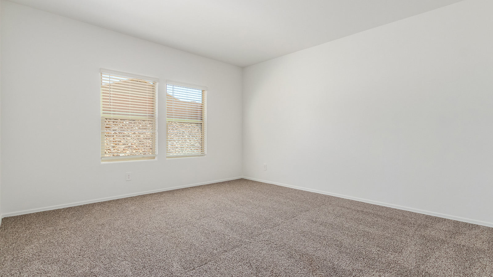 Experience the charm of The Cali, located within the peaceful Sycamore Vista community in the serene foothills of the Santa Rita Mountains, Arizona. This thoughtfully laid-out, single-story home offers 1,823 square feet of versatile living space designed to meet the needs of modern families.  Step into the inviting entryway, where you're welcomed by a spacious great room that serves as the heart of the home. The open-concept design connects the great room to the dining area and kitchen, creating a harmonious flow that's perfect for both entertaining and daily living. The kitchen is a true culinary haven, featuring a large island, granite countertops, and ample storage space with a walk-in pantry.  The Cali's four bedrooms are designed with relaxation in mind. The primary suite, tucked away from the other bedrooms, offers a private oasis complete with a walk-in closet and a well-appointed bathroom featuring dual vanities. The additional three bedrooms share a well-equipped bathroom and are situated to provide comfort and privacy for family members or guests.  Adding to the home's appeal are the premium standard features that come included in every Cali at Sycamore Vista. Enjoy the elegance of staggered wood-look ceramic tile flooring throughout the main living areas, complemented by Shaker-style cabinetry in the kitchen and bathrooms. The kitchen is further enhanced by an open single basin stainless steel sink paired with a water filtration system, making both cooking and cleanup a breeze. The energy-efficient design includes spray foam insulation, a tankless water heater, and LED lighting throughout, all contributing to lower utility costs and a more sustainable lifestyle.  Outdoor living is a breeze with the covered patio, easily accessible from the dining room, providing the perfect spot for morning coffee or evening gatherings. The three-car garage offers plenty of space for vehicles and storage, ensuring that everything you need is within easy reach.  Sycamore Vista's location offers a unique blend of tranquility and convenience, making The Cali an ideal choice for those seeking a peaceful retreat with easy access to modern amenities. Whether you're relaxing indoors or enjoying the outdoor beauty of Arizona, The Cali is a home that combines style, comfort, and functionality in every detail.