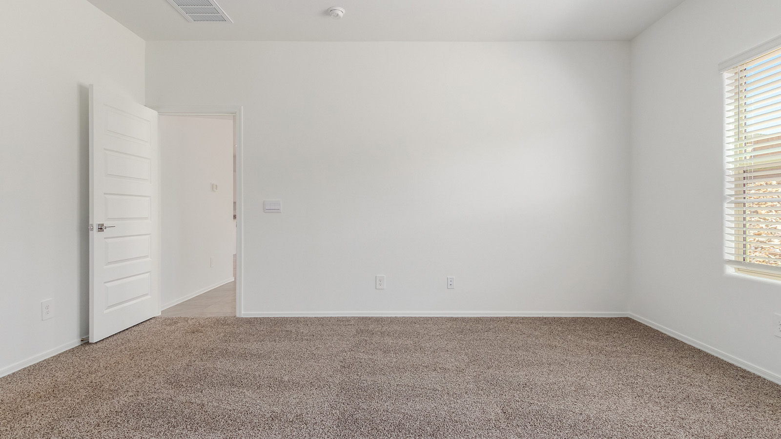 Experience the charm of The Cali, located within the peaceful Sycamore Vista community in the serene foothills of the Santa Rita Mountains, Arizona. This thoughtfully laid-out, single-story home offers 1,823 square feet of versatile living space designed to meet the needs of modern families.  Step into the inviting entryway, where you're welcomed by a spacious great room that serves as the heart of the home. The open-concept design connects the great room to the dining area and kitchen, creating a harmonious flow that's perfect for both entertaining and daily living. The kitchen is a true culinary haven, featuring a large island, granite countertops, and ample storage space with a walk-in pantry.  The Cali's four bedrooms are designed with relaxation in mind. The primary suite, tucked away from the other bedrooms, offers a private oasis complete with a walk-in closet and a well-appointed bathroom featuring dual vanities. The additional three bedrooms share a well-equipped bathroom and are situated to provide comfort and privacy for family members or guests.  Adding to the home's appeal are the premium standard features that come included in every Cali at Sycamore Vista. Enjoy the elegance of staggered wood-look ceramic tile flooring throughout the main living areas, complemented by Shaker-style cabinetry in the kitchen and bathrooms. The kitchen is further enhanced by an open single basin stainless steel sink paired with a water filtration system, making both cooking and cleanup a breeze. The energy-efficient design includes spray foam insulation, a tankless water heater, and LED lighting throughout, all contributing to lower utility costs and a more sustainable lifestyle.  Outdoor living is a breeze with the covered patio, easily accessible from the dining room, providing the perfect spot for morning coffee or evening gatherings. The three-car garage offers plenty of space for vehicles and storage, ensuring that everything you need is within easy reach.  Sycamore Vista's location offers a unique blend of tranquility and convenience, making The Cali an ideal choice for those seeking a peaceful retreat with easy access to modern amenities. Whether you're relaxing indoors or enjoying the outdoor beauty of Arizona, The Cali is a home that combines style, comfort, and functionality in every detail.