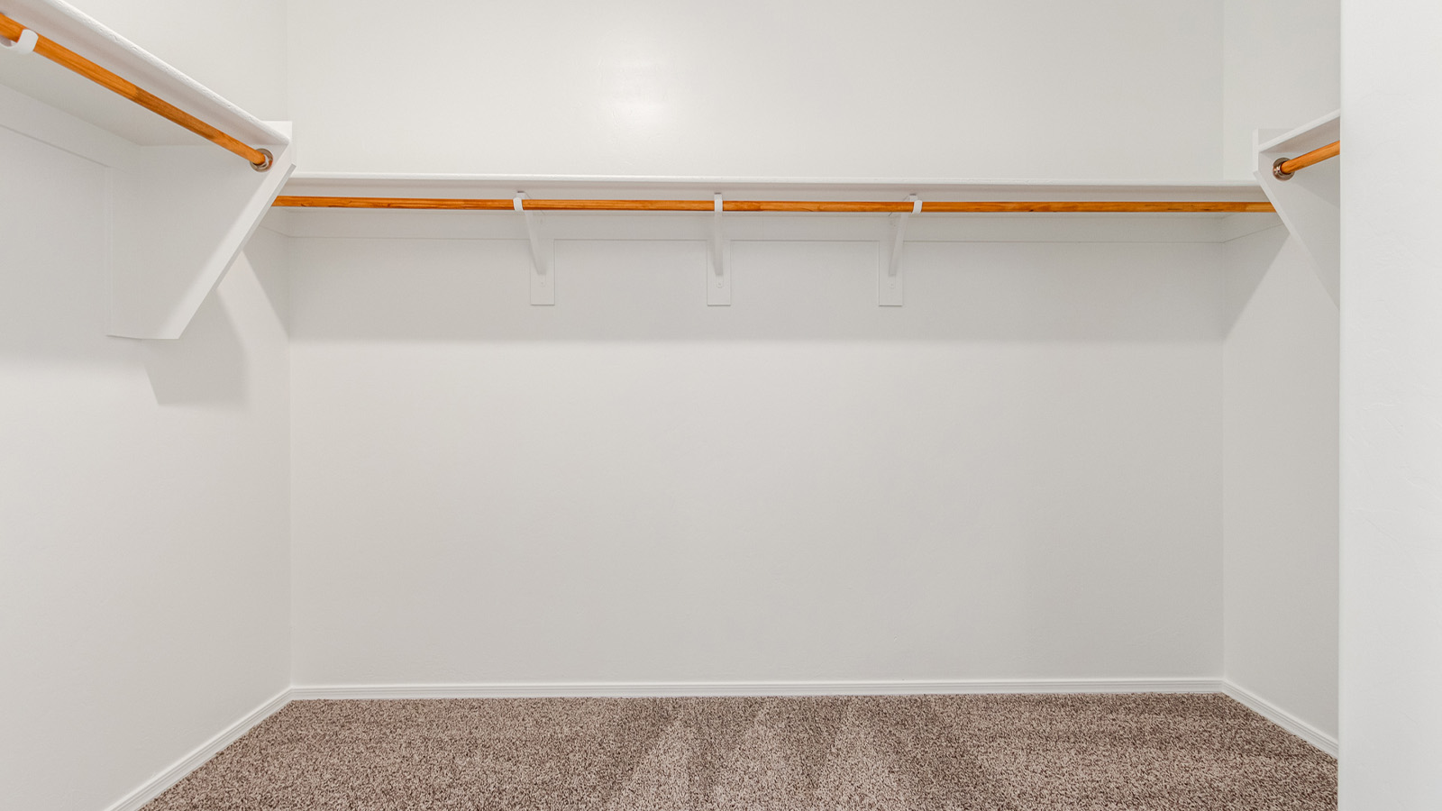 Experience the charm of The Cali, located within the peaceful Sycamore Vista community in the serene foothills of the Santa Rita Mountains, Arizona. This thoughtfully laid-out, single-story home offers 1,823 square feet of versatile living space designed to meet the needs of modern families.  Step into the inviting entryway, where you're welcomed by a spacious great room that serves as the heart of the home. The open-concept design connects the great room to the dining area and kitchen, creating a harmonious flow that's perfect for both entertaining and daily living. The kitchen is a true culinary haven, featuring a large island, granite countertops, and ample storage space with a walk-in pantry.  The Cali's four bedrooms are designed with relaxation in mind. The primary suite, tucked away from the other bedrooms, offers a private oasis complete with a walk-in closet and a well-appointed bathroom featuring dual vanities. The additional three bedrooms share a well-equipped bathroom and are situated to provide comfort and privacy for family members or guests.  Adding to the home's appeal are the premium standard features that come included in every Cali at Sycamore Vista. Enjoy the elegance of staggered wood-look ceramic tile flooring throughout the main living areas, complemented by Shaker-style cabinetry in the kitchen and bathrooms. The kitchen is further enhanced by an open single basin stainless steel sink paired with a water filtration system, making both cooking and cleanup a breeze. The energy-efficient design includes spray foam insulation, a tankless water heater, and LED lighting throughout, all contributing to lower utility costs and a more sustainable lifestyle.  Outdoor living is a breeze with the covered patio, easily accessible from the dining room, providing the perfect spot for morning coffee or evening gatherings. The three-car garage offers plenty of space for vehicles and storage, ensuring that everything you need is within easy reach.  Sycamore Vista's location offers a unique blend of tranquility and convenience, making The Cali an ideal choice for those seeking a peaceful retreat with easy access to modern amenities. Whether you're relaxing indoors or enjoying the outdoor beauty of Arizona, The Cali is a home that combines style, comfort, and functionality in every detail.