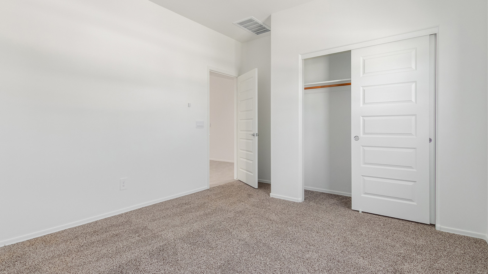 Experience the charm of The Cali, located within the peaceful Sycamore Vista community in the serene foothills of the Santa Rita Mountains, Arizona. This thoughtfully laid-out, single-story home offers 1,823 square feet of versatile living space designed to meet the needs of modern families.  Step into the inviting entryway, where you're welcomed by a spacious great room that serves as the heart of the home. The open-concept design connects the great room to the dining area and kitchen, creating a harmonious flow that's perfect for both entertaining and daily living. The kitchen is a true culinary haven, featuring a large island, granite countertops, and ample storage space with a walk-in pantry.  The Cali's four bedrooms are designed with relaxation in mind. The primary suite, tucked away from the other bedrooms, offers a private oasis complete with a walk-in closet and a well-appointed bathroom featuring dual vanities. The additional three bedrooms share a well-equipped bathroom and are situated to provide comfort and privacy for family members or guests.  Adding to the home's appeal are the premium standard features that come included in every Cali at Sycamore Vista. Enjoy the elegance of staggered wood-look ceramic tile flooring throughout the main living areas, complemented by Shaker-style cabinetry in the kitchen and bathrooms. The kitchen is further enhanced by an open single basin stainless steel sink paired with a water filtration system, making both cooking and cleanup a breeze. The energy-efficient design includes spray foam insulation, a tankless water heater, and LED lighting throughout, all contributing to lower utility costs and a more sustainable lifestyle.  Outdoor living is a breeze with the covered patio, easily accessible from the dining room, providing the perfect spot for morning coffee or evening gatherings. The three-car garage offers plenty of space for vehicles and storage, ensuring that everything you need is within easy reach.  Sycamore Vista's location offers a unique blend of tranquility and convenience, making The Cali an ideal choice for those seeking a peaceful retreat with easy access to modern amenities. Whether you're relaxing indoors or enjoying the outdoor beauty of Arizona, The Cali is a home that combines style, comfort, and functionality in every detail.