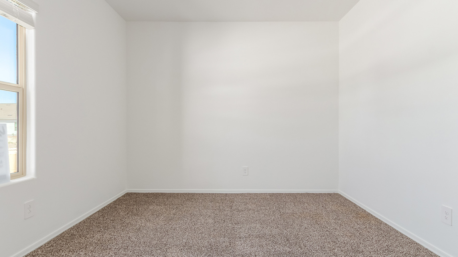 Experience the charm of The Cali, located within the peaceful Sycamore Vista community in the serene foothills of the Santa Rita Mountains, Arizona. This thoughtfully laid-out, single-story home offers 1,823 square feet of versatile living space designed to meet the needs of modern families.  Step into the inviting entryway, where you're welcomed by a spacious great room that serves as the heart of the home. The open-concept design connects the great room to the dining area and kitchen, creating a harmonious flow that's perfect for both entertaining and daily living. The kitchen is a true culinary haven, featuring a large island, granite countertops, and ample storage space with a walk-in pantry.  The Cali's four bedrooms are designed with relaxation in mind. The primary suite, tucked away from the other bedrooms, offers a private oasis complete with a walk-in closet and a well-appointed bathroom featuring dual vanities. The additional three bedrooms share a well-equipped bathroom and are situated to provide comfort and privacy for family members or guests.  Adding to the home's appeal are the premium standard features that come included in every Cali at Sycamore Vista. Enjoy the elegance of staggered wood-look ceramic tile flooring throughout the main living areas, complemented by Shaker-style cabinetry in the kitchen and bathrooms. The kitchen is further enhanced by an open single basin stainless steel sink paired with a water filtration system, making both cooking and cleanup a breeze. The energy-efficient design includes spray foam insulation, a tankless water heater, and LED lighting throughout, all contributing to lower utility costs and a more sustainable lifestyle.  Outdoor living is a breeze with the covered patio, easily accessible from the dining room, providing the perfect spot for morning coffee or evening gatherings. The three-car garage offers plenty of space for vehicles and storage, ensuring that everything you need is within easy reach.  Sycamore Vista's location offers a unique blend of tranquility and convenience, making The Cali an ideal choice for those seeking a peaceful retreat with easy access to modern amenities. Whether you're relaxing indoors or enjoying the outdoor beauty of Arizona, The Cali is a home that combines style, comfort, and functionality in every detail.